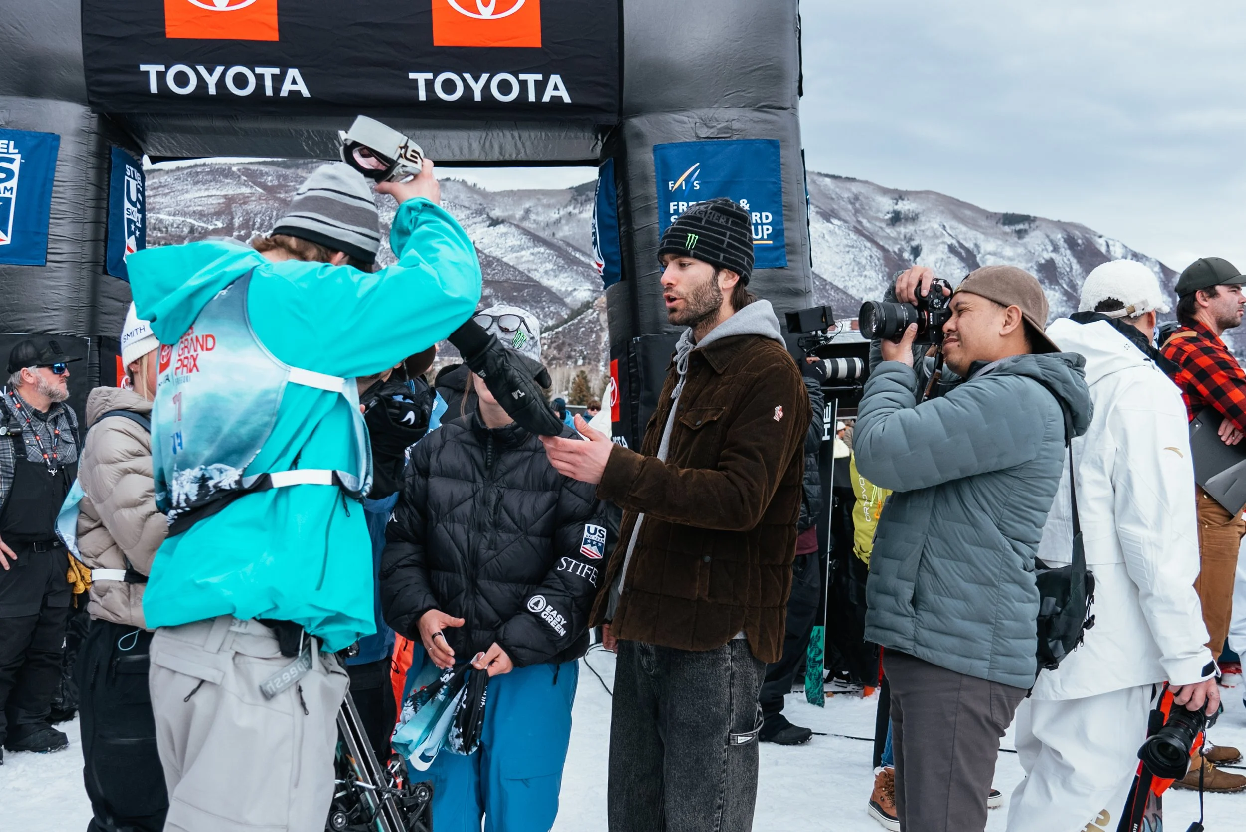 A photographer taking  a photo of the finish line at U.S. Olympic Qualifiers