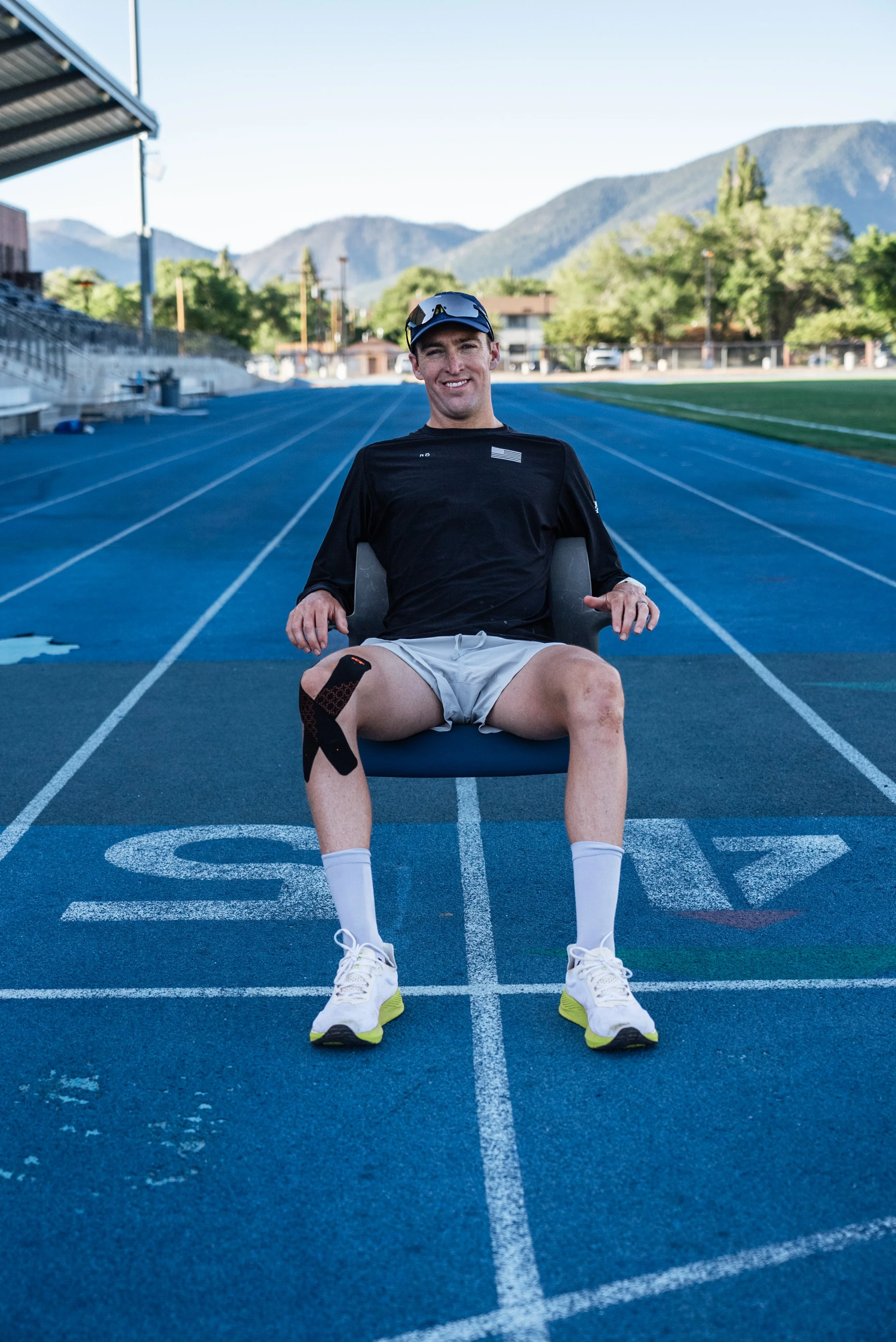 man sitting on track