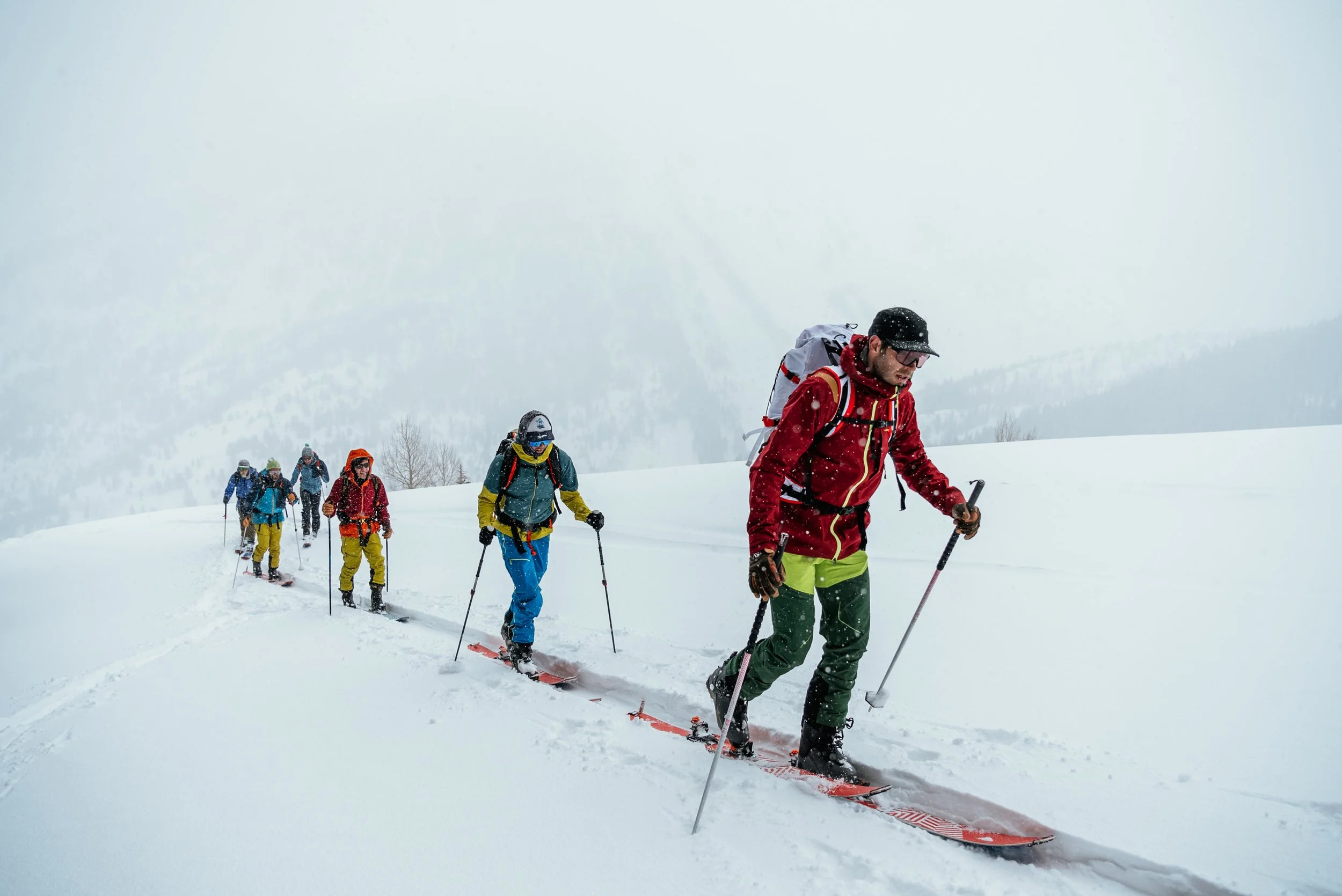 group of backcountry skiers adventuring in the snow