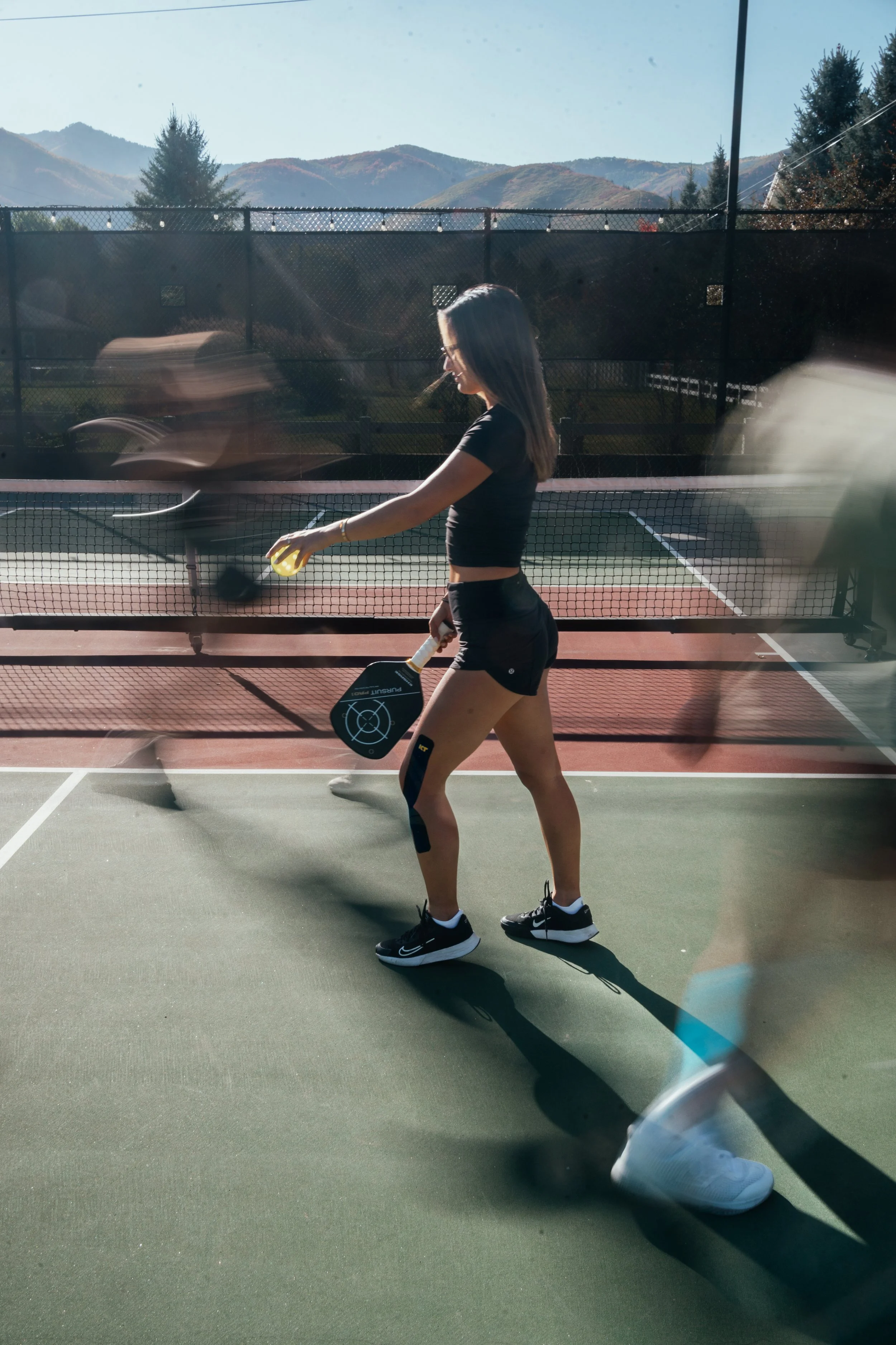 a long exposure photo of a pickleball match