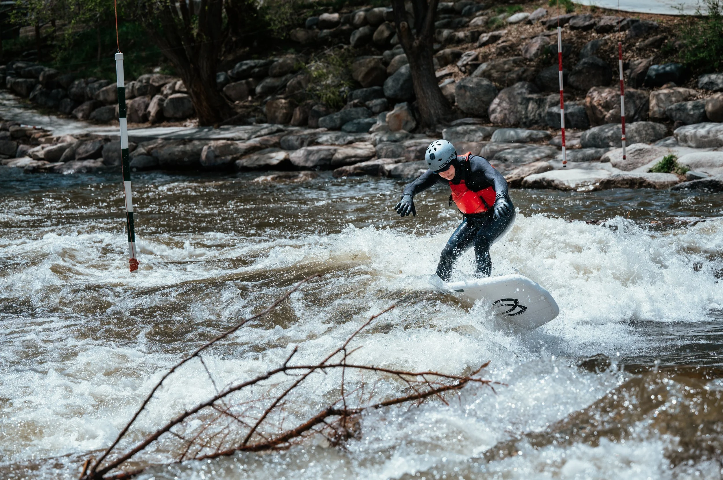 Roo Smith surfing in a river