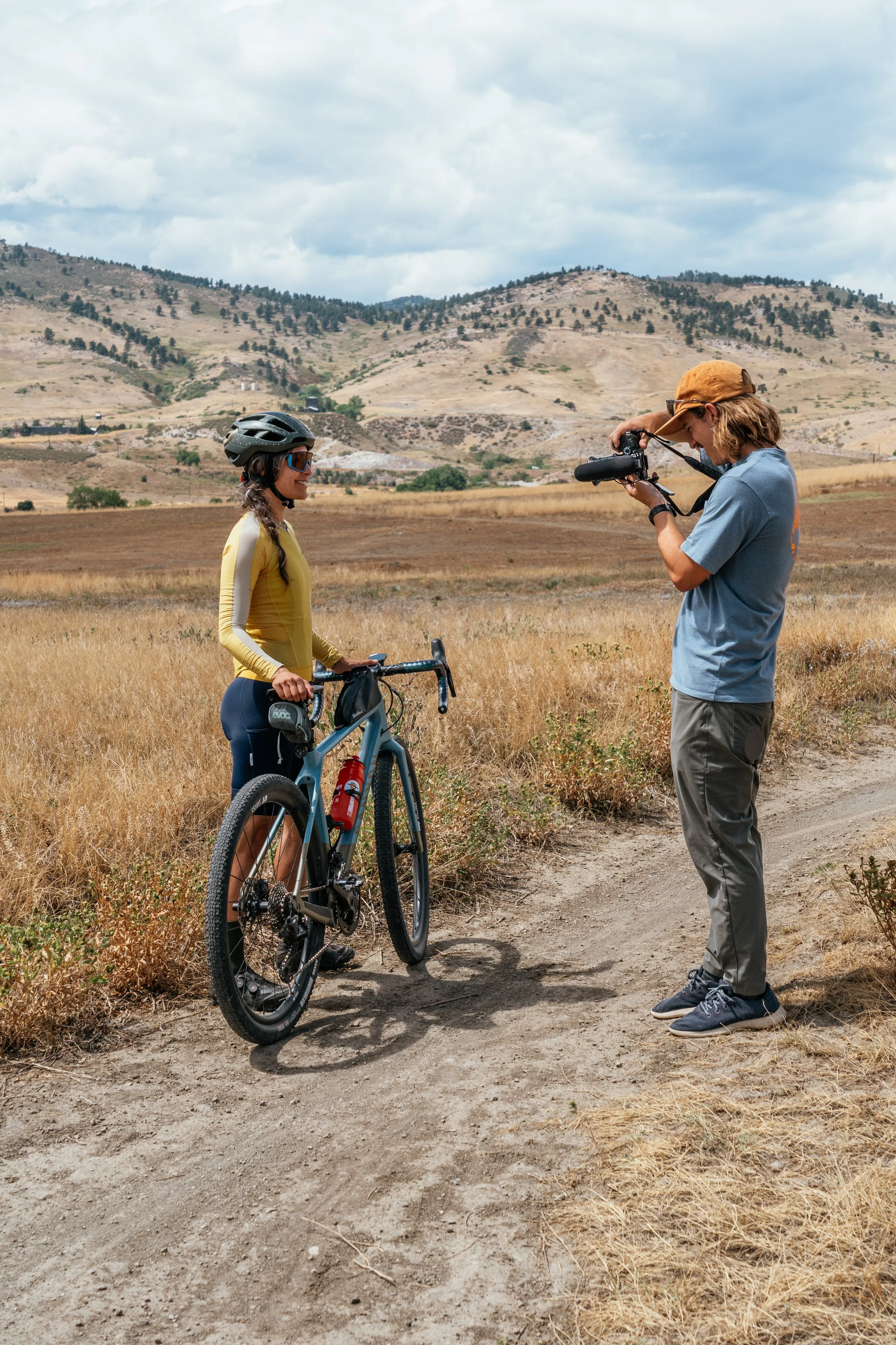 Roo taking a photo of a female cyclist
