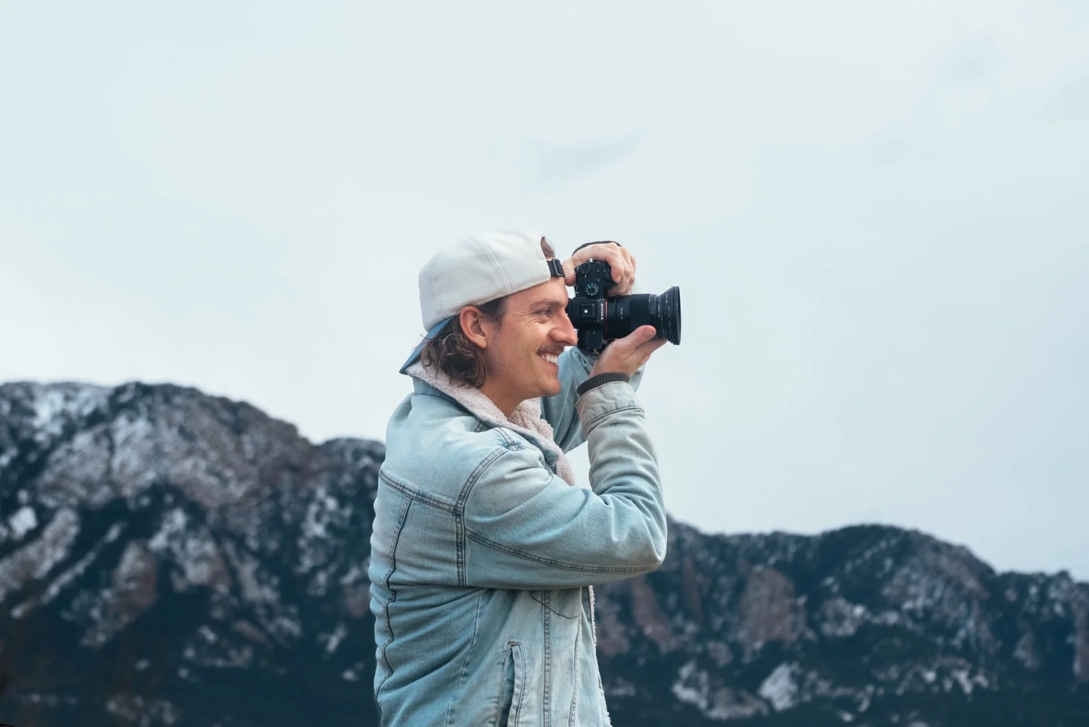 Roo holding a camera in boulder