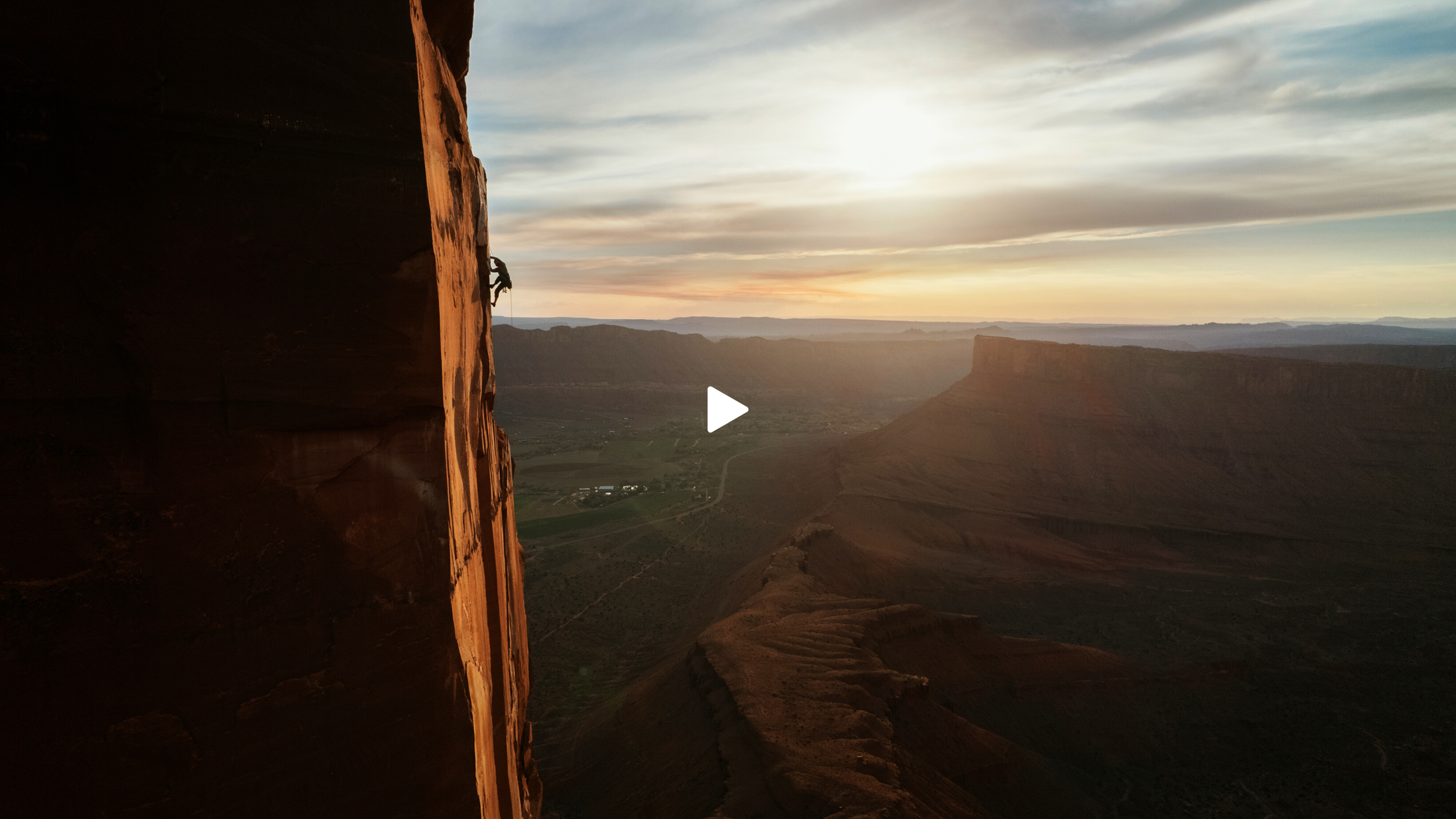 drone shot of a climber above the utah desert