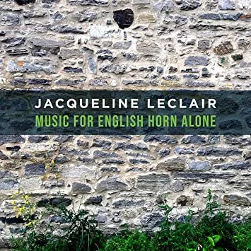 A recording album with a stone wall with the text "Jacqueline Leclair, Music for English Horn Alone" overlaid in white and green letters.