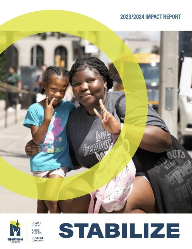 Two smiling girls making peace signs in an urban street scene, with a city building and vehicles in the background, featured on a report cover titled '2023/2024 Impact Report' with the word 'STABILIZE' at the bottom.