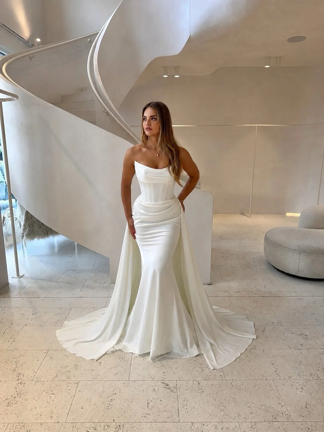 London from @montaignebridal now has an optional overskirt 🎀 Would you wear with or without? We think with for the extra drama 🤍

Arriving end of August/September
