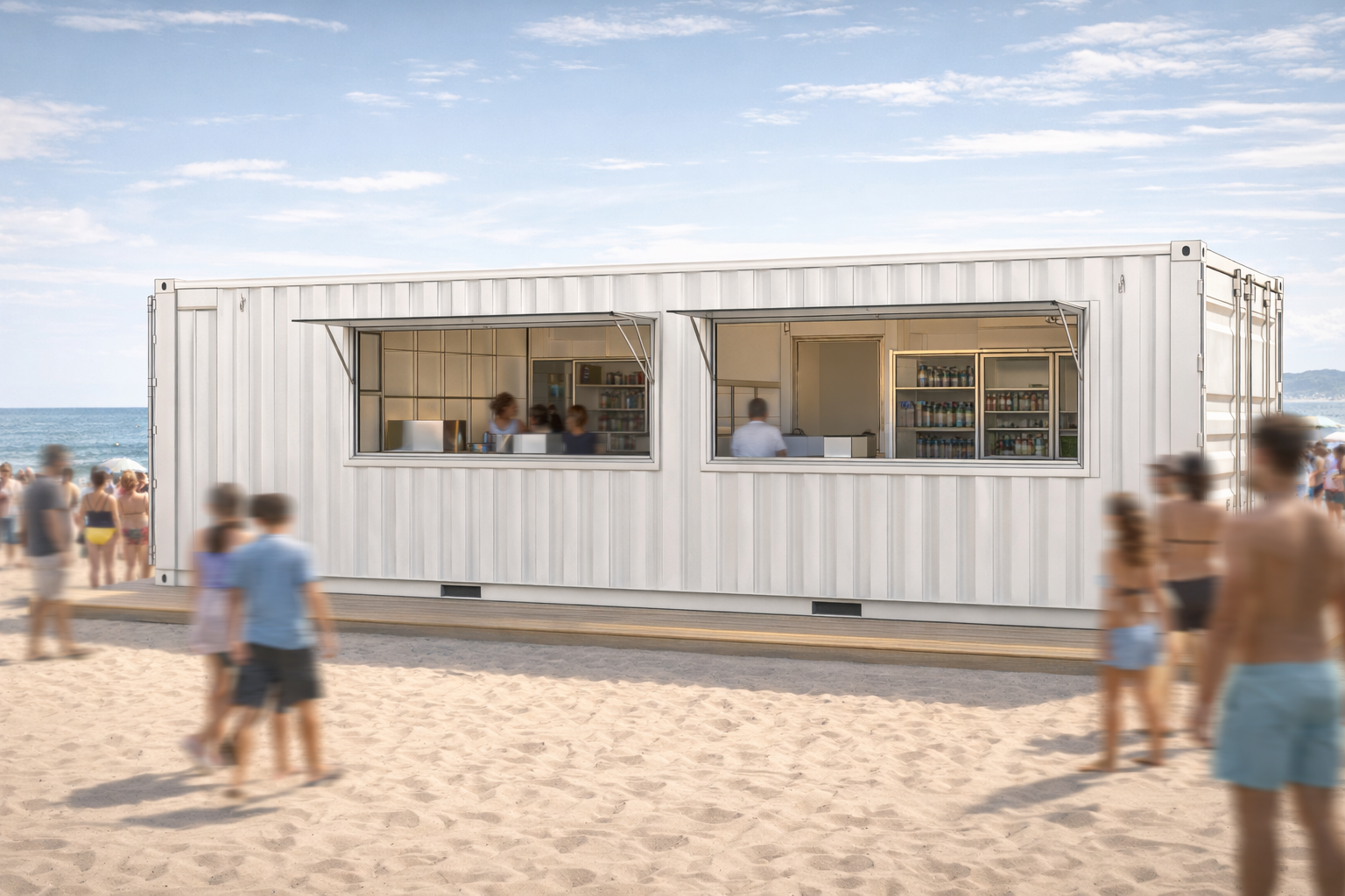 Beachside snack bar container with large windows, showing staff and shelves of drinks inside, surrounded by blurred people on sandy beach under partly cloudy sky.