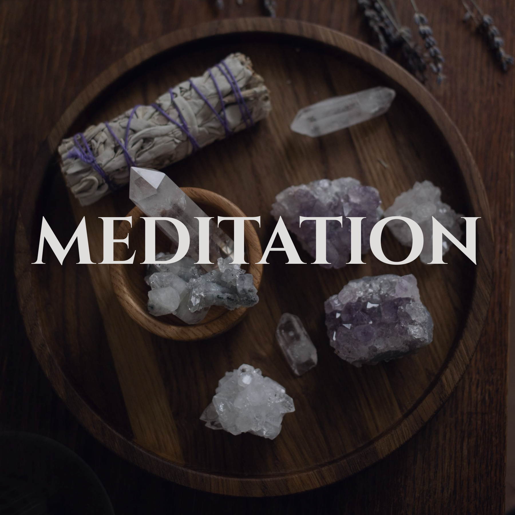 A wooden tray with white sage bundle, clear quartz crystal points, and purple amethyst crystals, used for meditation.