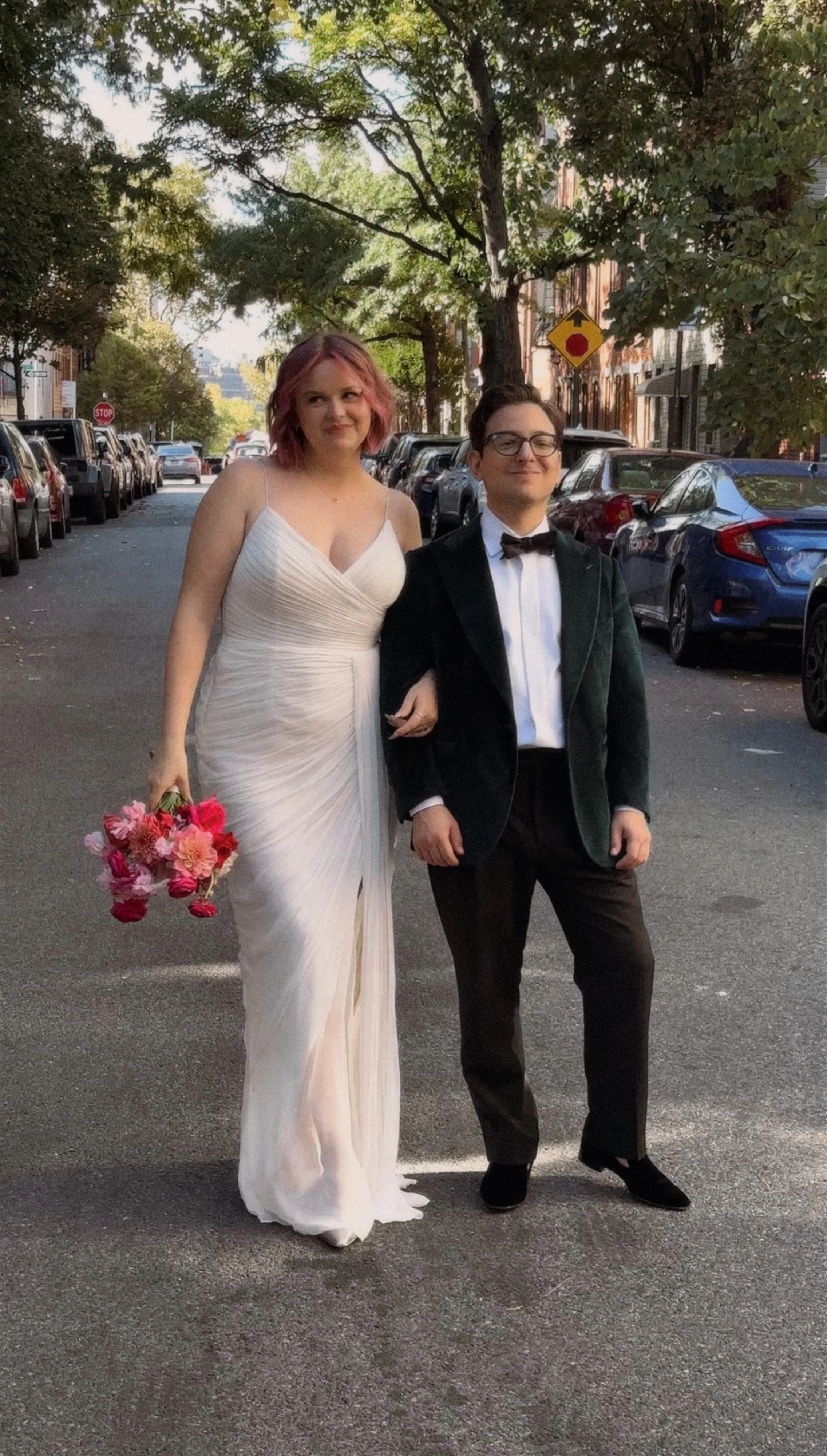 bride and groom posing in NYC street