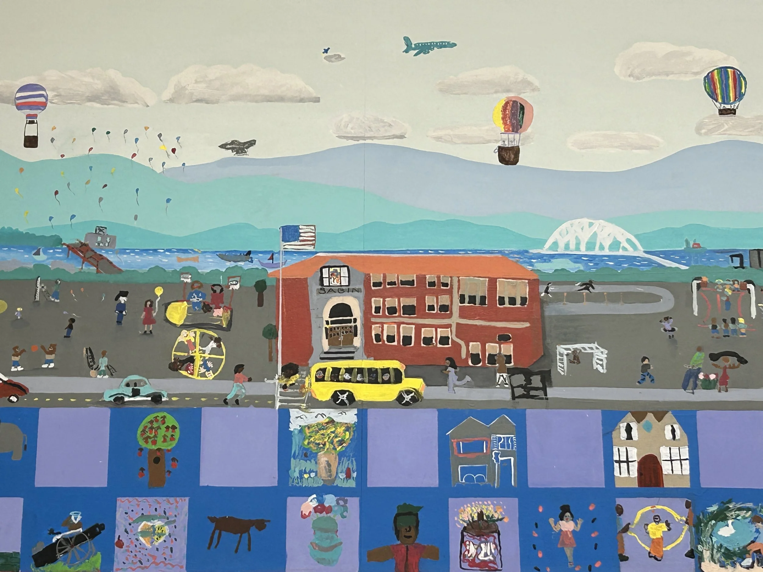 A colorful mural made by students, depicting Sabin School and the surrounding neighborhood.