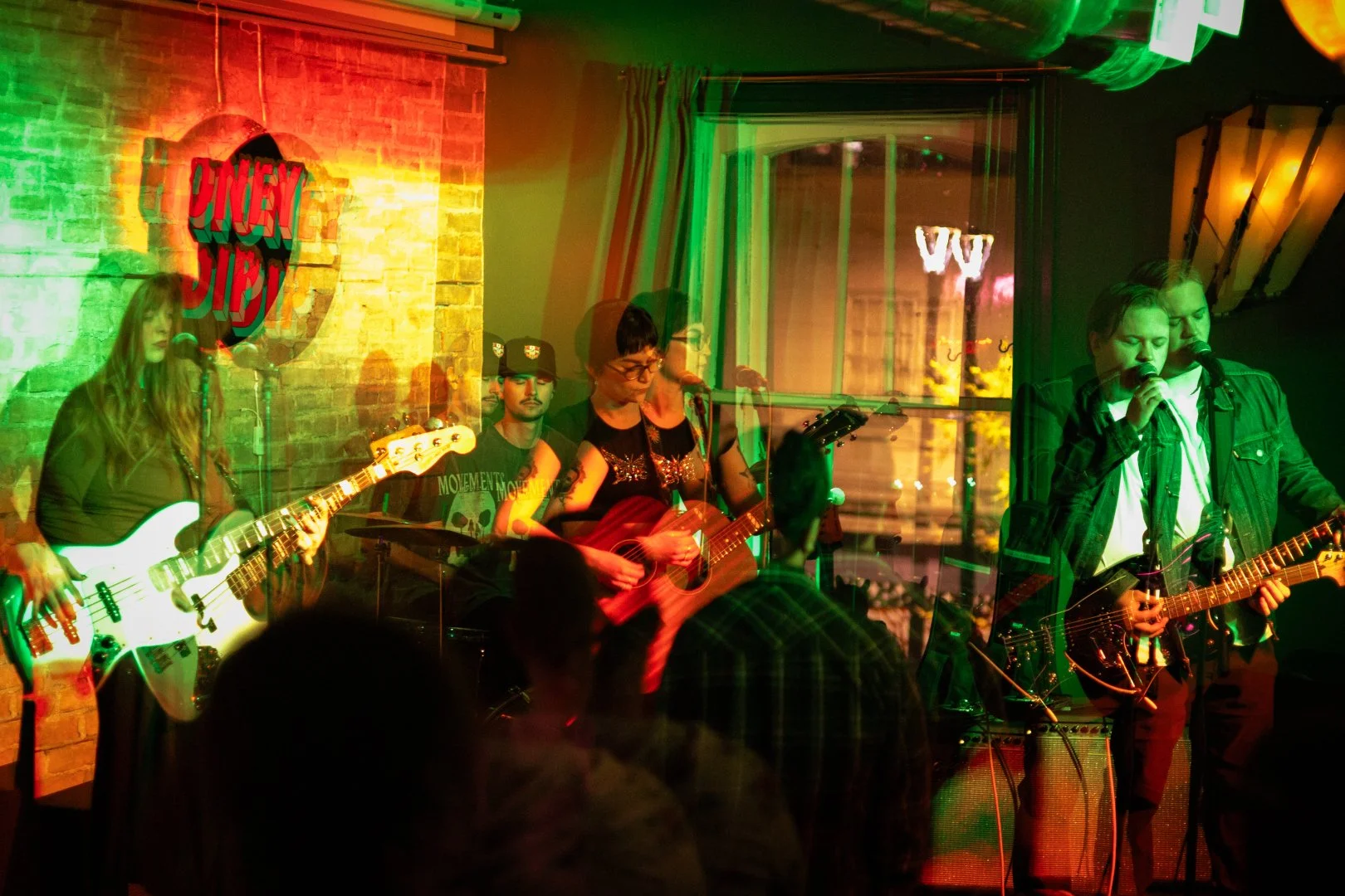 A touring band takes the stage to a full house. Photo by Justice Bekke.