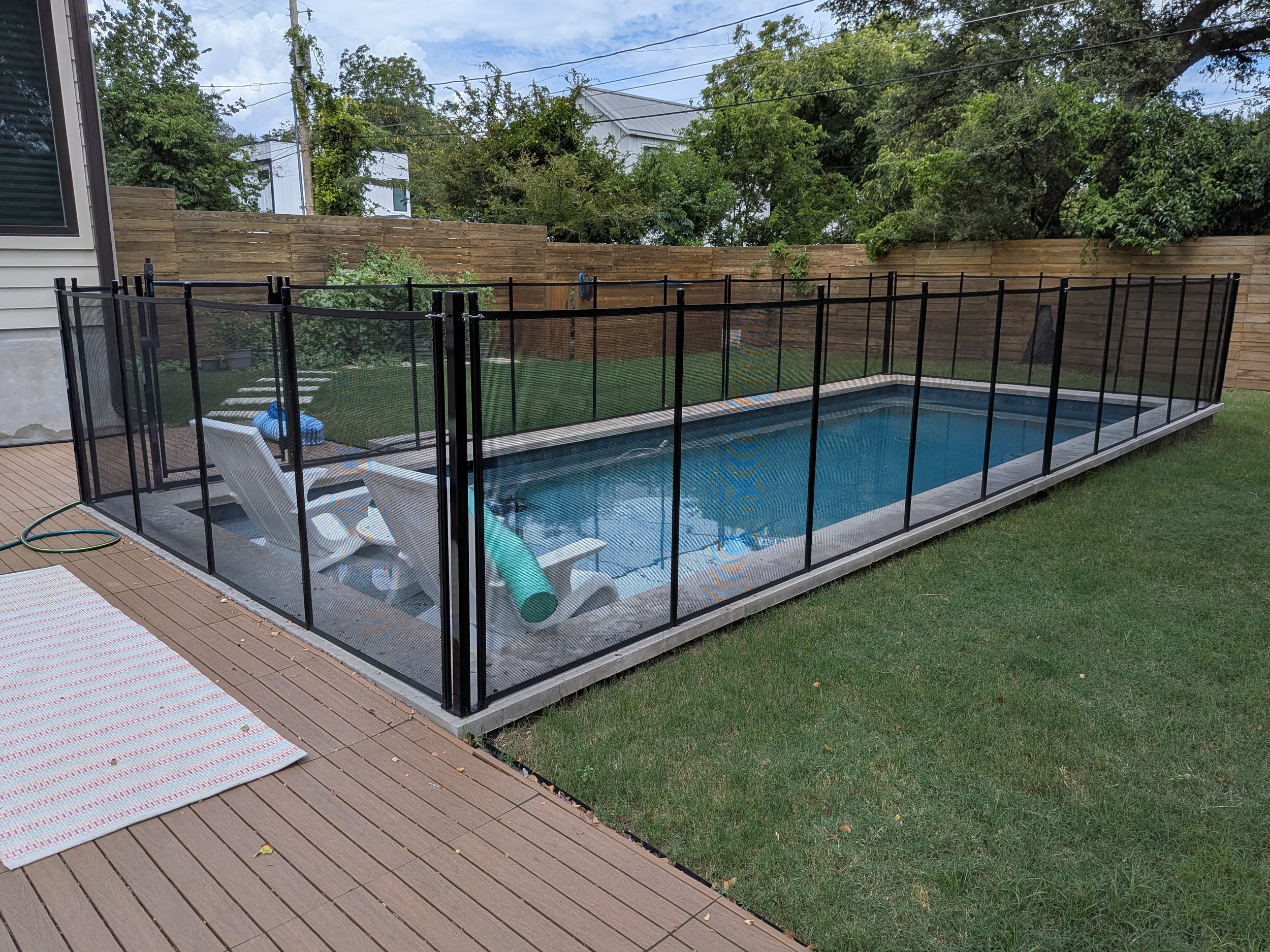 Black Pool Fence in Coping.jpg