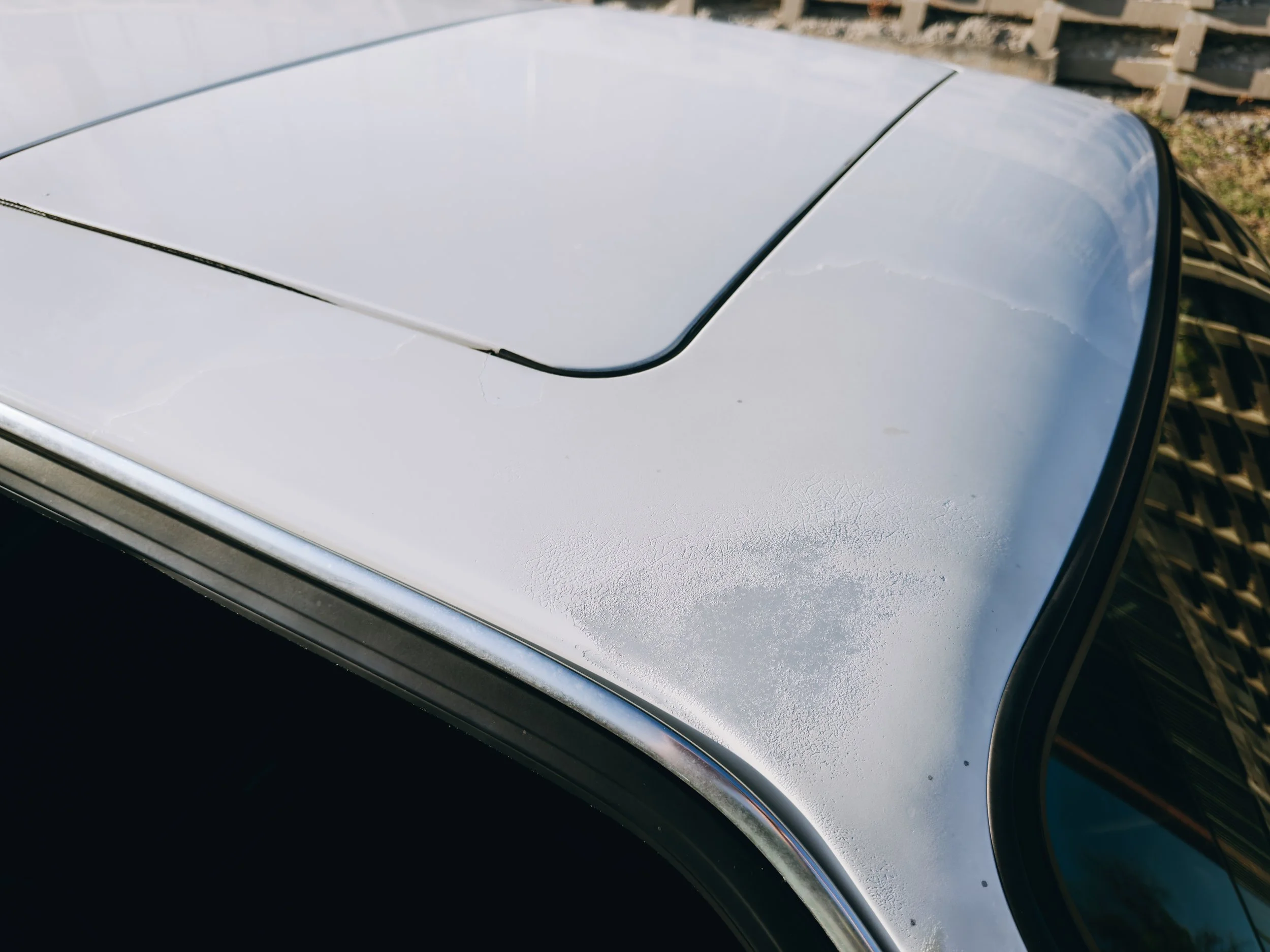 Passenger side roof paint damage