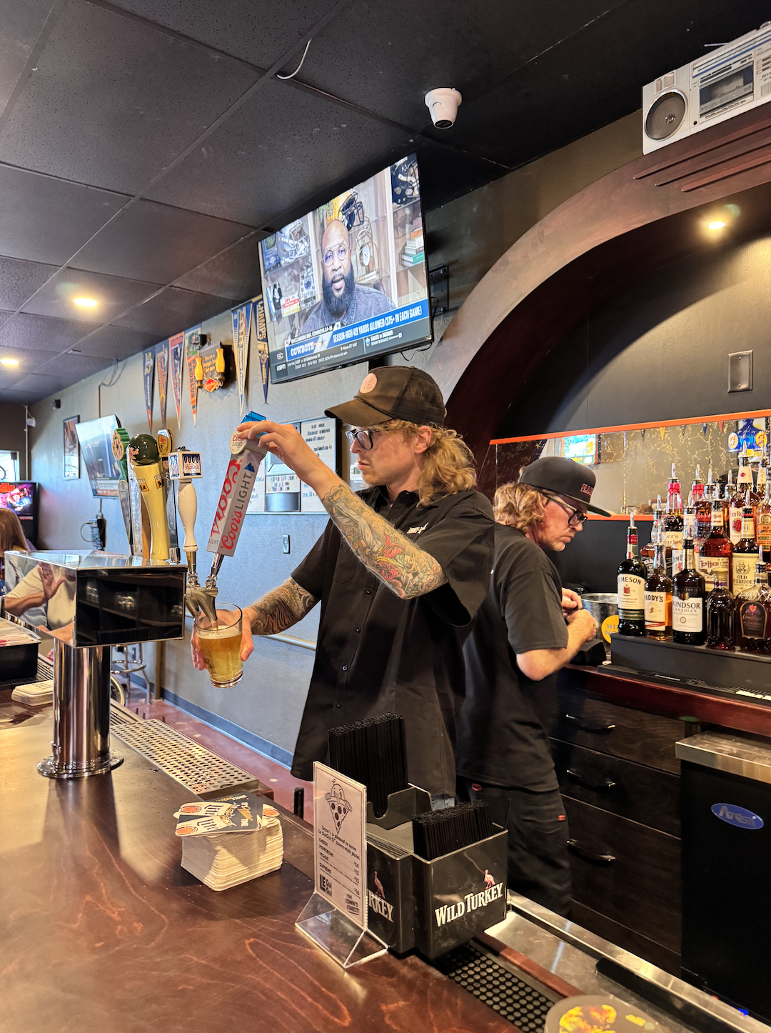 Bar tender pouring a beer