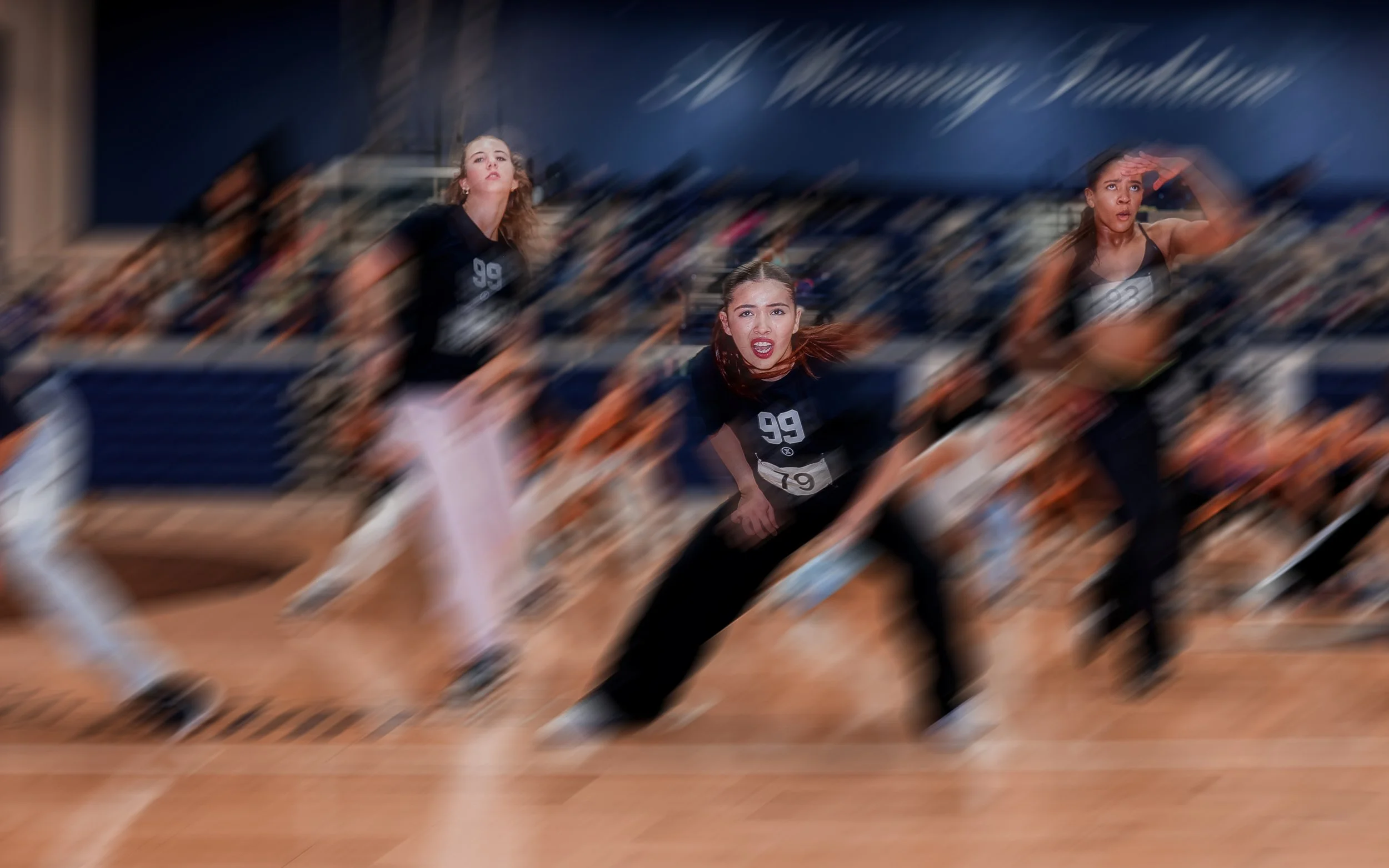 Group of dancers performing a hip-hop routine at TRIBE 99 training event