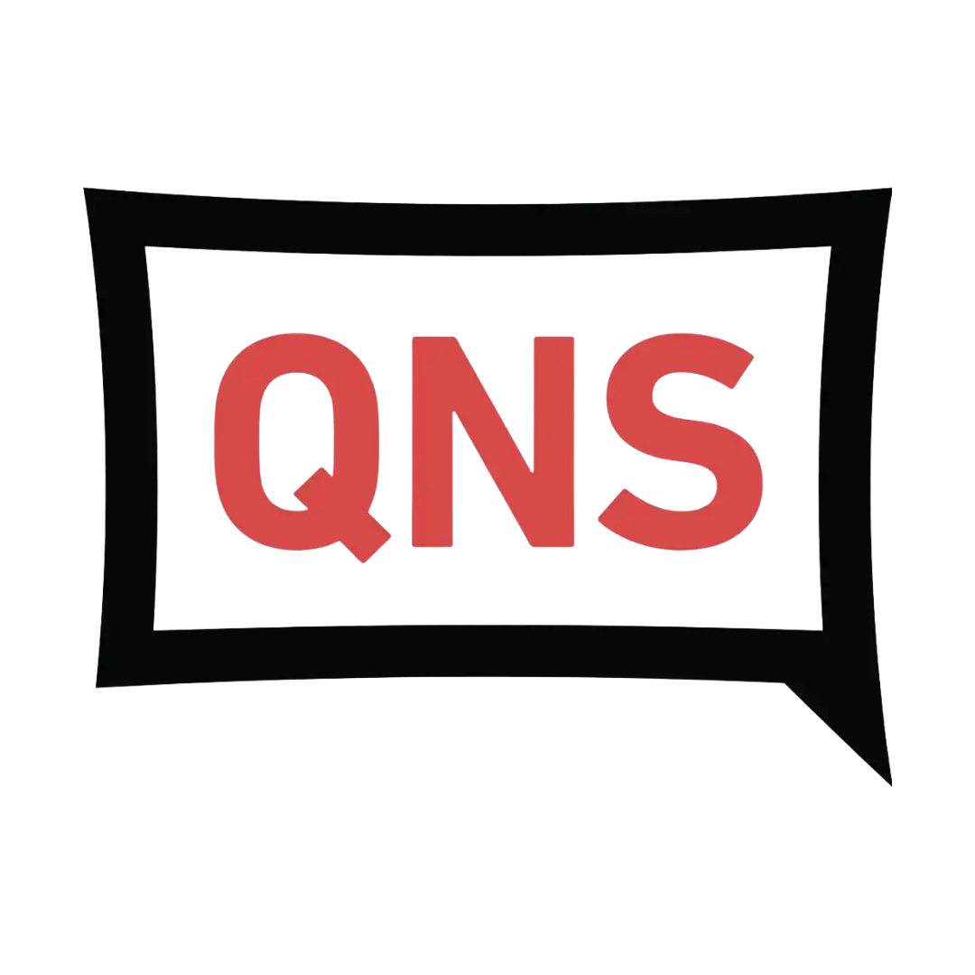 Neon sign displaying the word 'QNS' in red letters inside a black speech bubble.