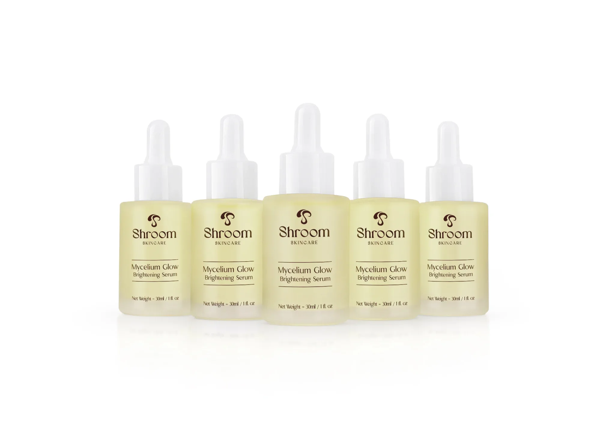 Five bottles of Shroom Skincare Mycelium Glow Brightening Serum lined up