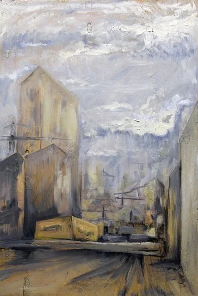 moody cityscape with cranes