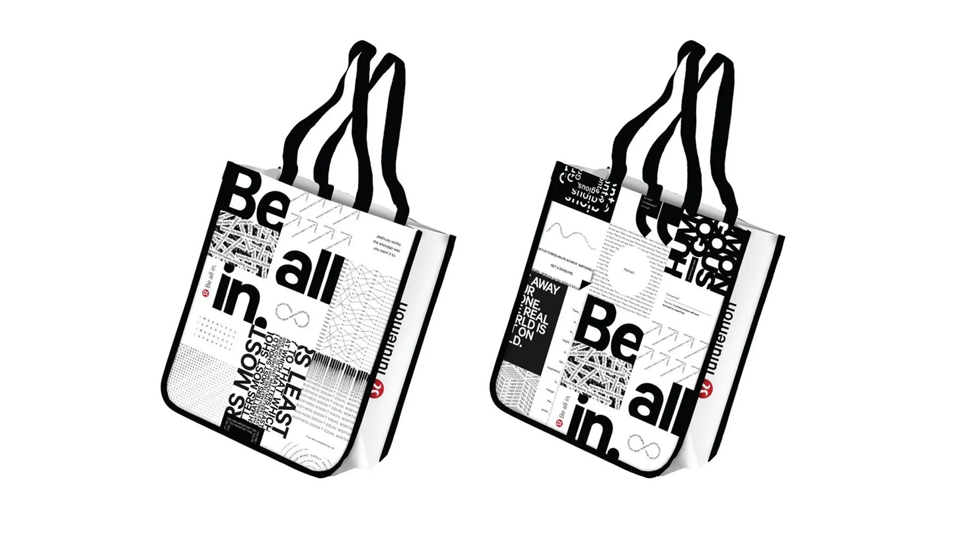 Two tote bags with black and white geometric and text patterns hanging from black handles.