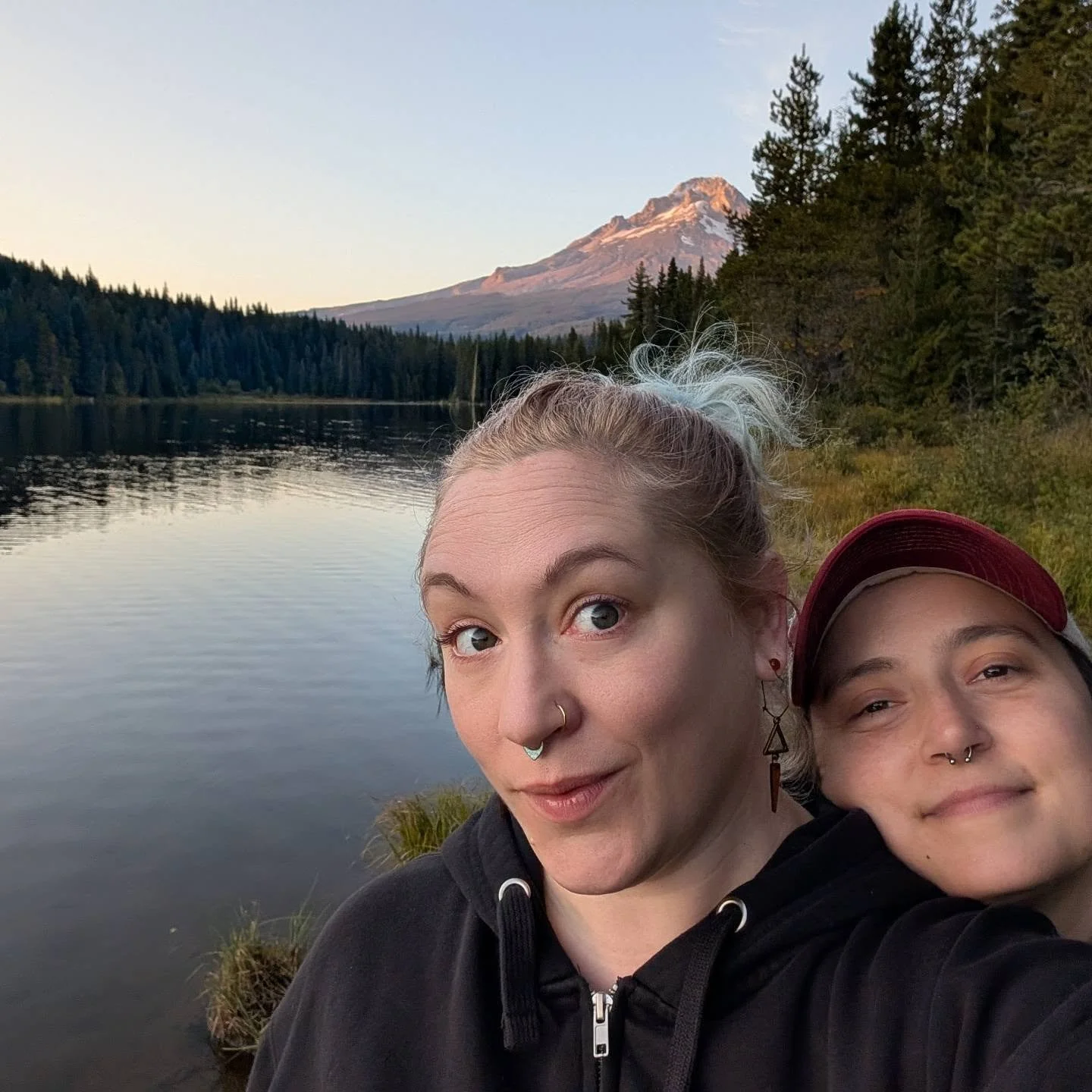 @chamomeleonpdx and @smashabeth spent a lovely evening in the shadow of Mt. Hood at Trillium Lake, reading our witchy little books and planning some wonderful surprises for the big show on October 16. What magically wicked moments are you hoping to s