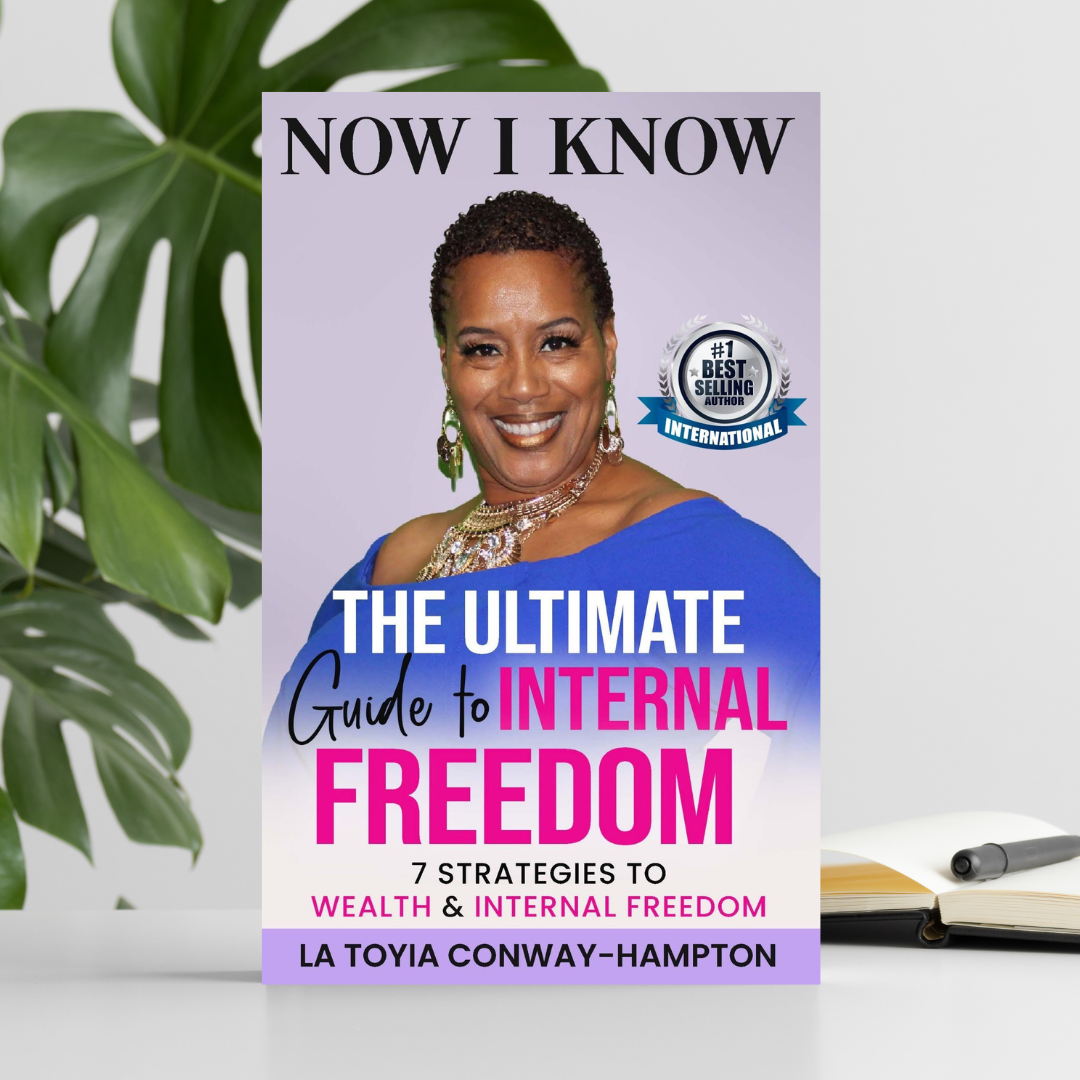 Book cover titled "The Ultimate Guide to Internal Freedom" by La Tovya Conway-Hampton, featuring a smiling woman in a blue dress with jewelry, on a background with a purple hue and a badge indicating "#1 Best Selling Author International."