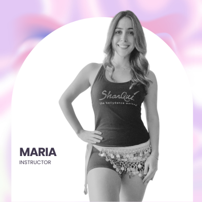 A woman in dance attire posing confidently, wearing a tank top with 'ShaCat' written on it and a decorative belt. The image includes her name Maria and the label Instructor.