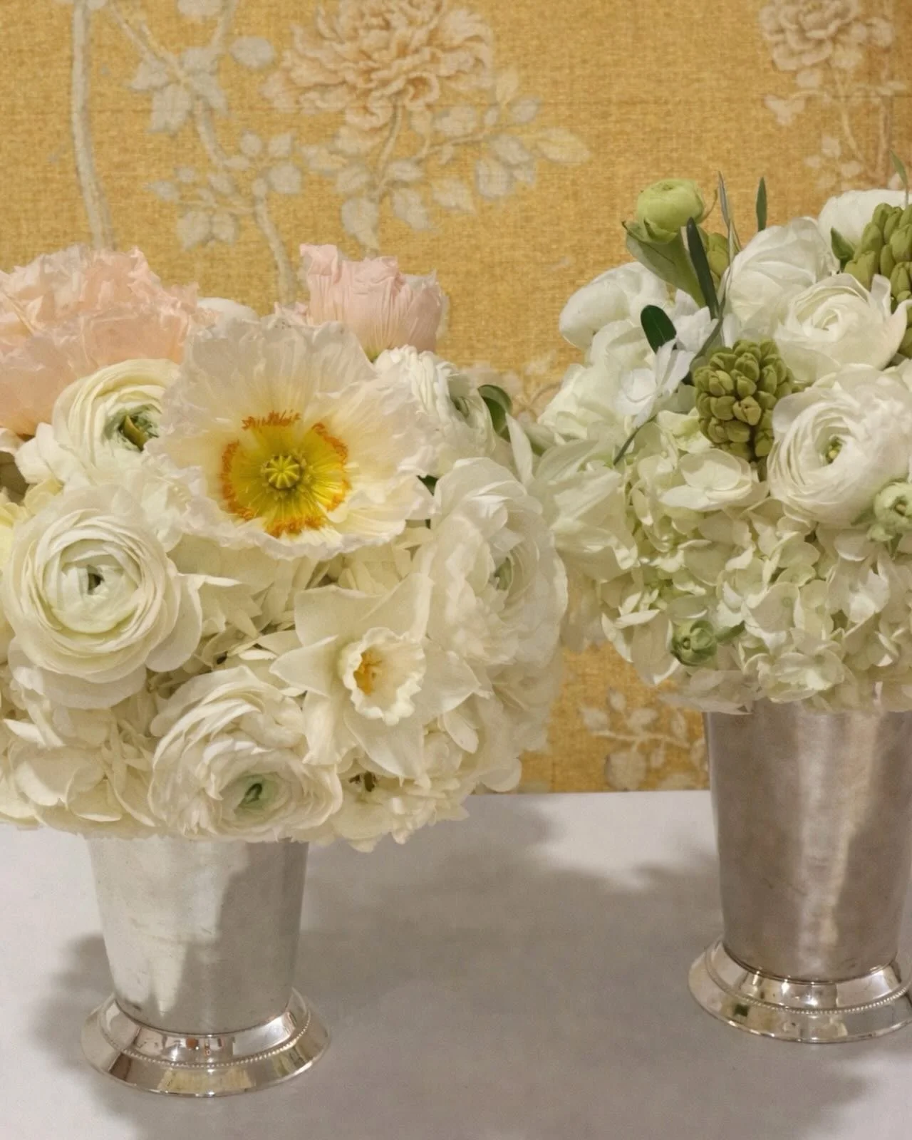 something to brighten up your morning! two silver vase arrangements with poppies, daffodils and hyacinth 🌞