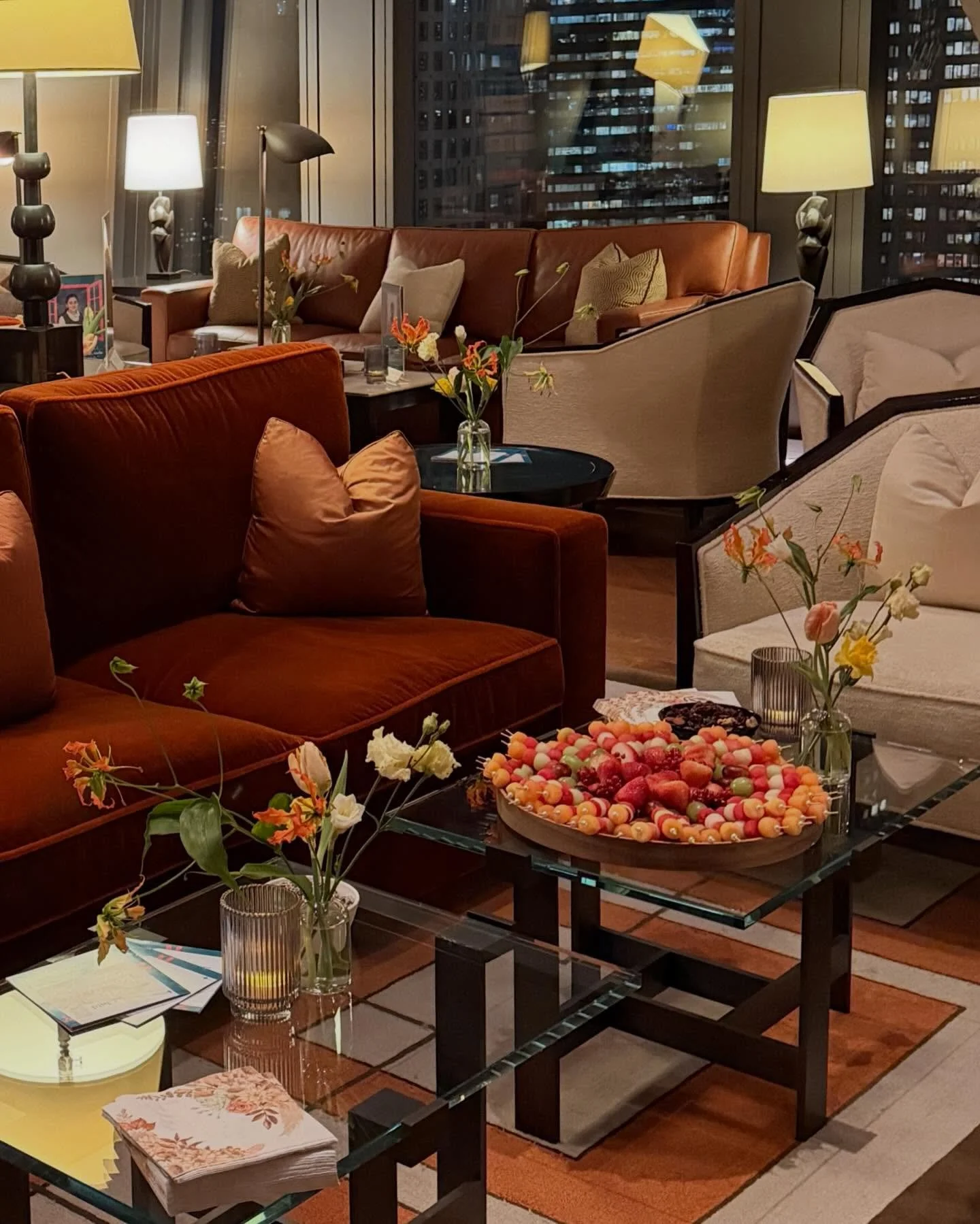 A meaningful, skyline lit evening with @ourheritageimpact, surrounded by inspiring people, in a beautiful space to design for, featuring floating fire lilies.