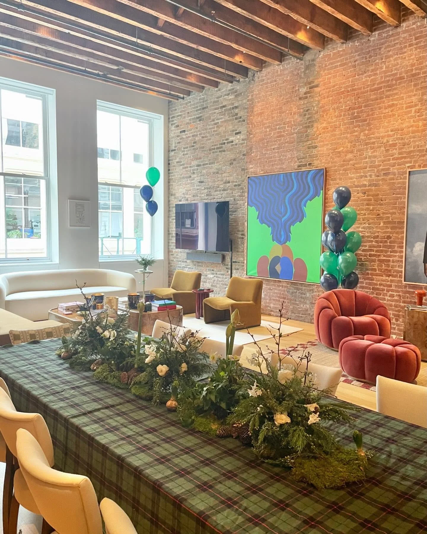 a storybook table for the sweetest baby shower. holiday tartan, with three juniper arrangements nestled into moss, pinecones, amaryllis, and hyacinth bulbs. a little winter wonderland. 🧸