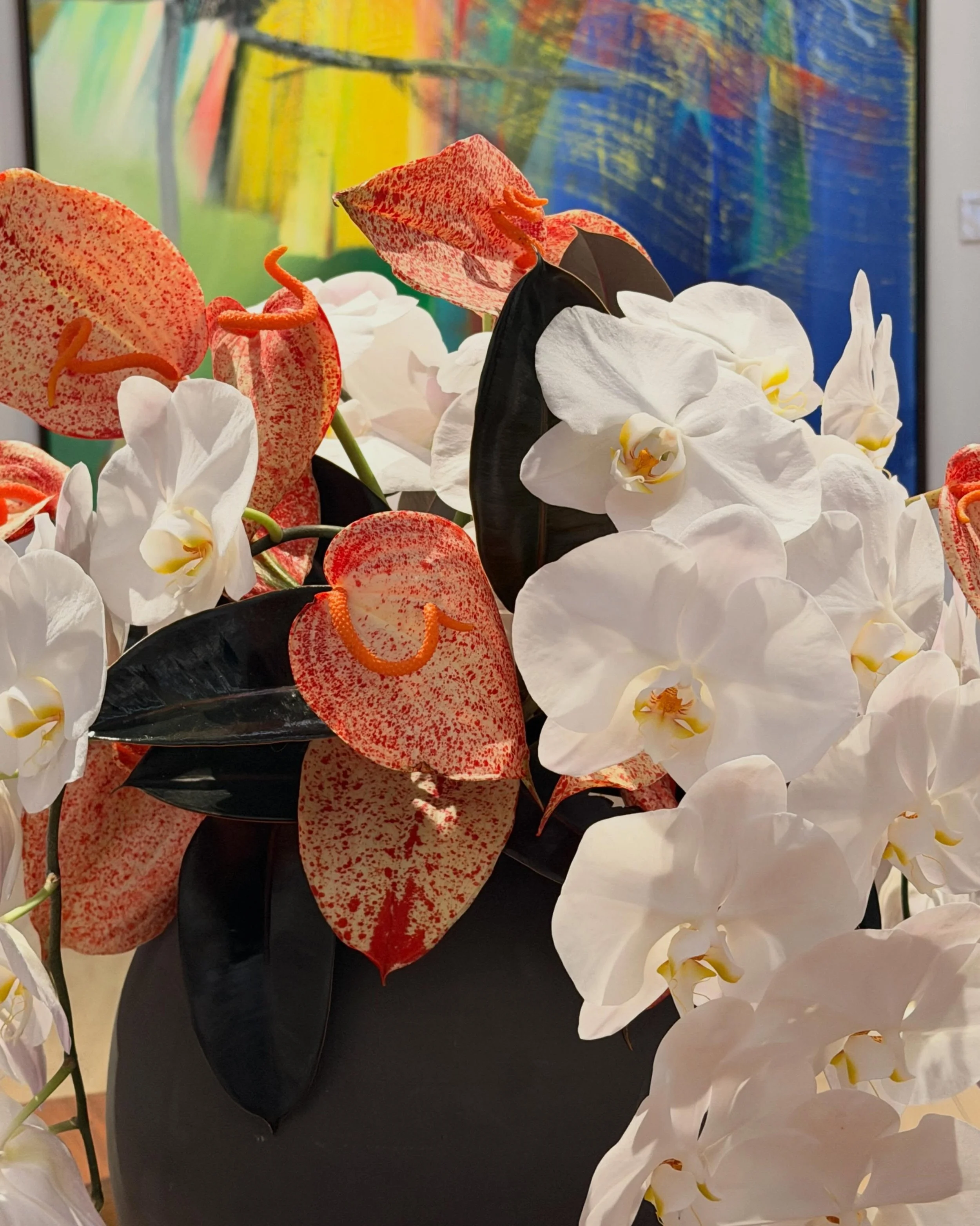 florals for phillips, composed for the modern &amp; contemporary auction preview.

white phalaenopsis orchids, speckled anthuriums, and black foliage formed an abstract, sculptural arrangement in conversation with the surrounding works, including and