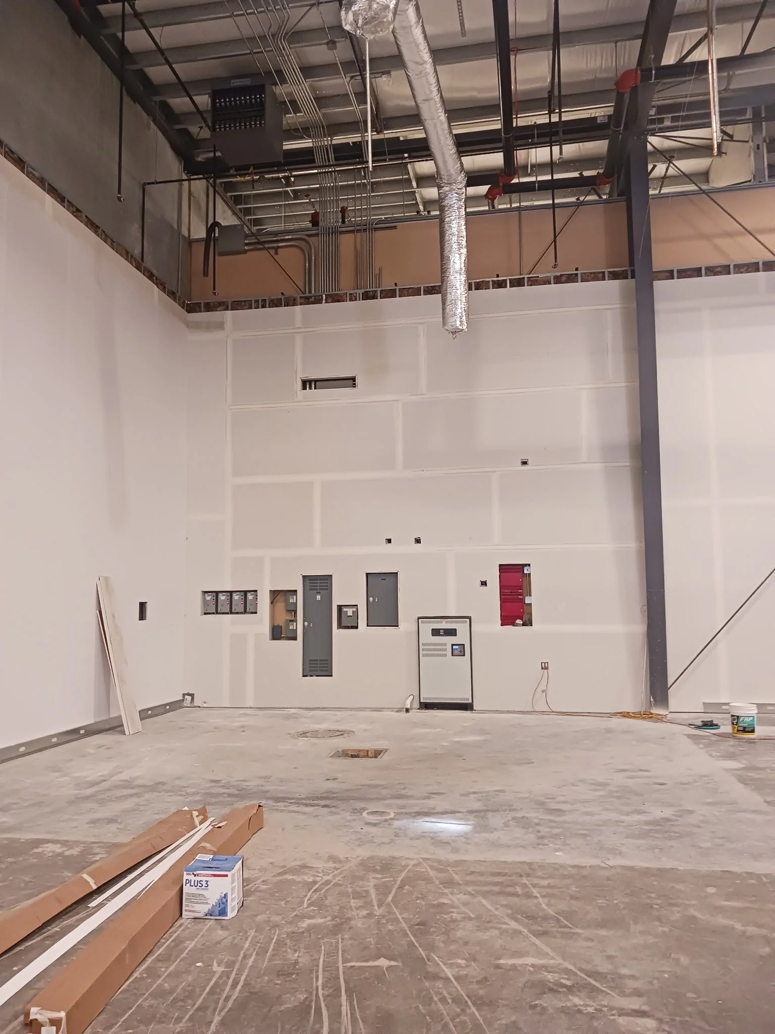 An image of warehouse drywall work