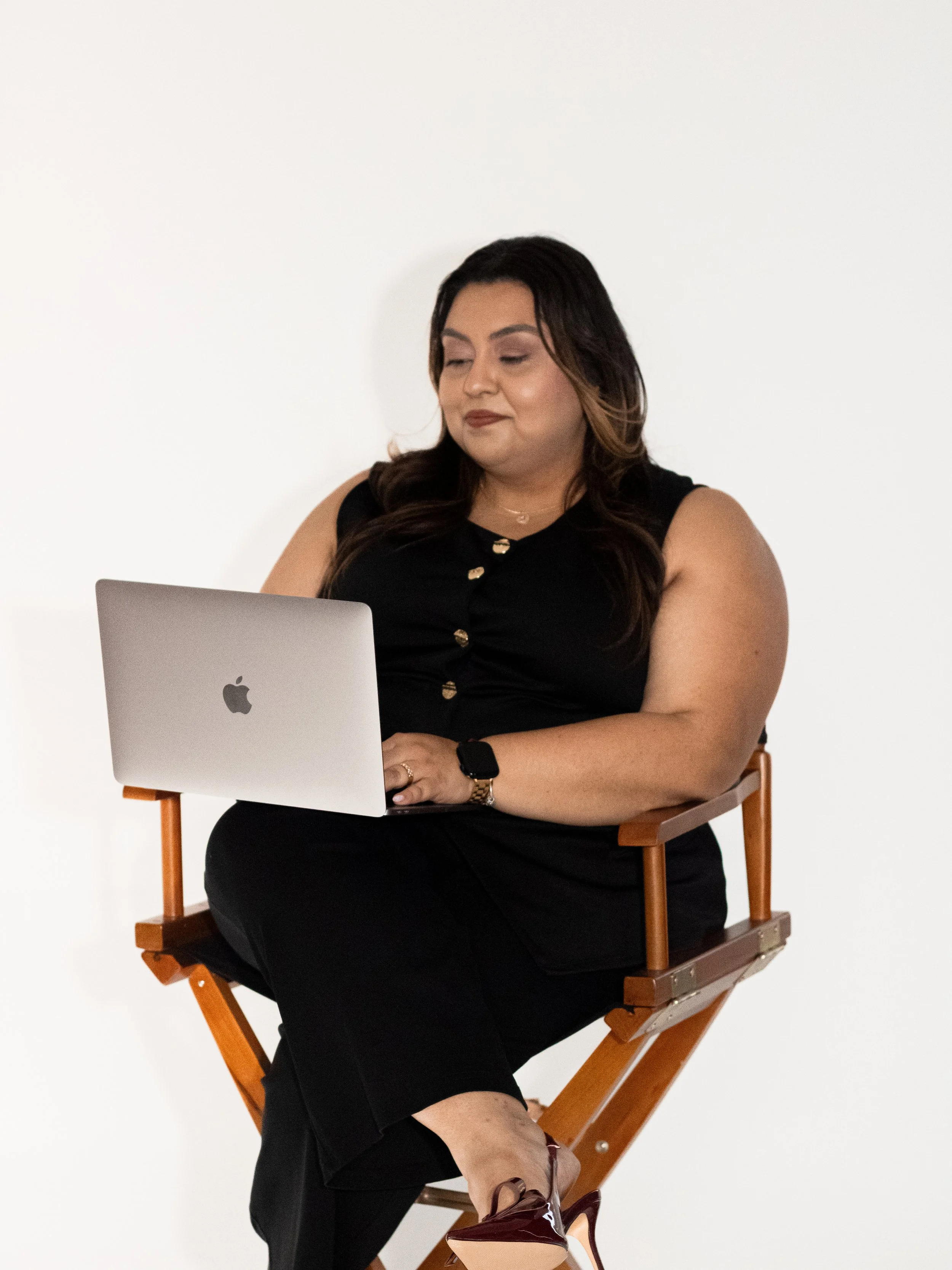 Joanna working on a pitch deck layout for a client project