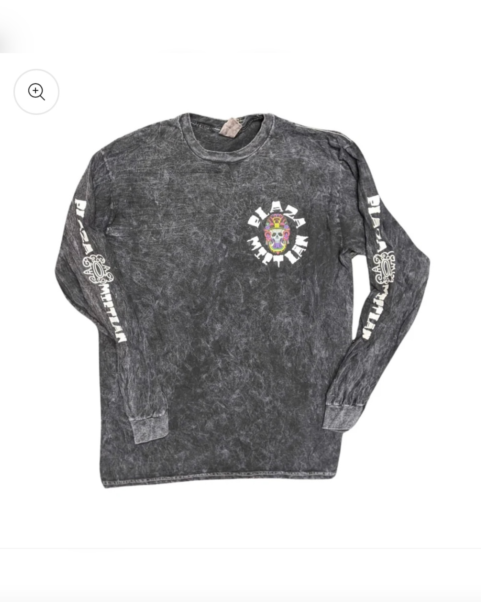 Gray long-sleeve shirt with graphic designs and text, featuring a small colorful skull with decorative elements on the chest and white text on the sleeves.