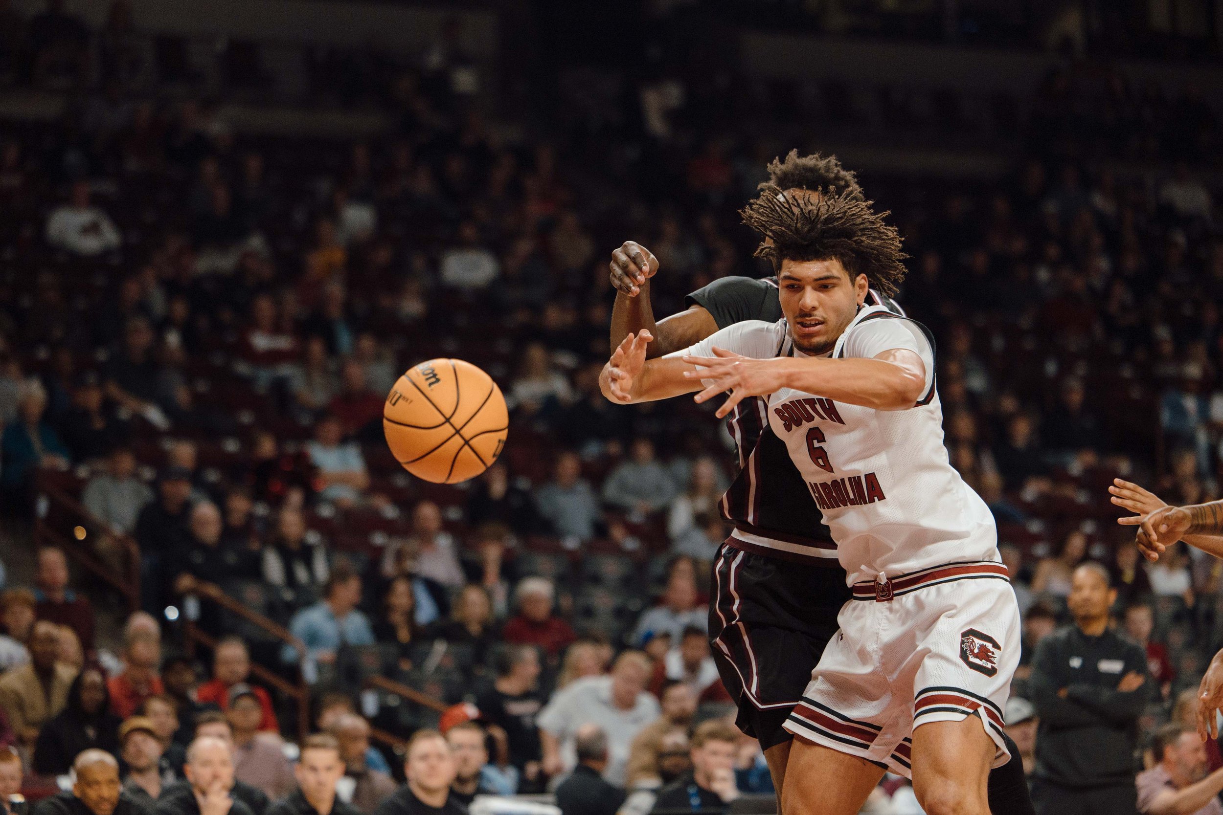 South Carolina’s Freshman E.J. Walker (#6), reaches for a loose ball while defended by Mississippi State during a game at Colonial Life Arena in Columbia, S.C. on Feb. 21, 2026. South Carolina defeated Mississippi State 97–89.