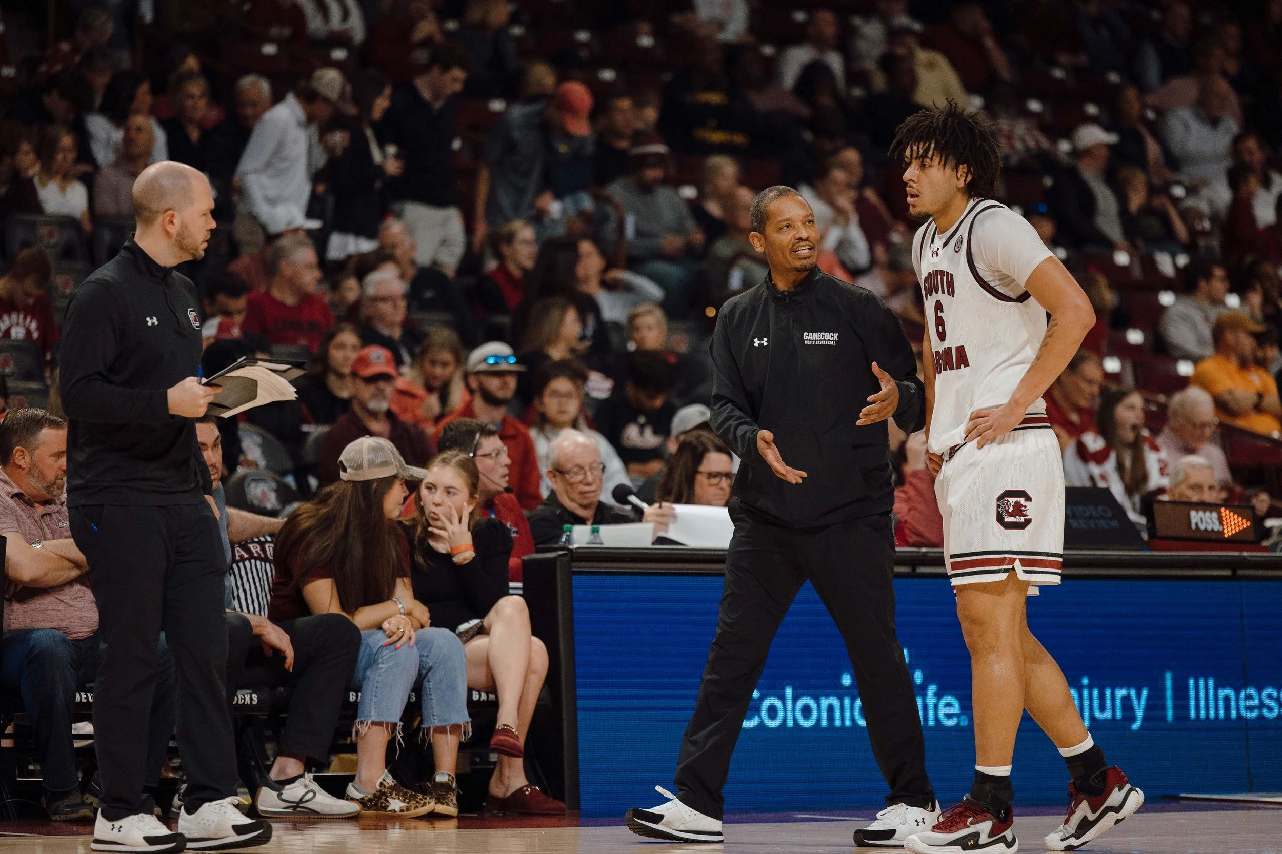 South Carolina head coach Lamont Paris speaks with Freshman E.J. Walker (#6), during a game against the Mississippi State Bulldogs at Colonial Life Arena in Columbia, S.C. on Feb. 21, 2026. South Carolina defeated Mississippi State 97–89. 