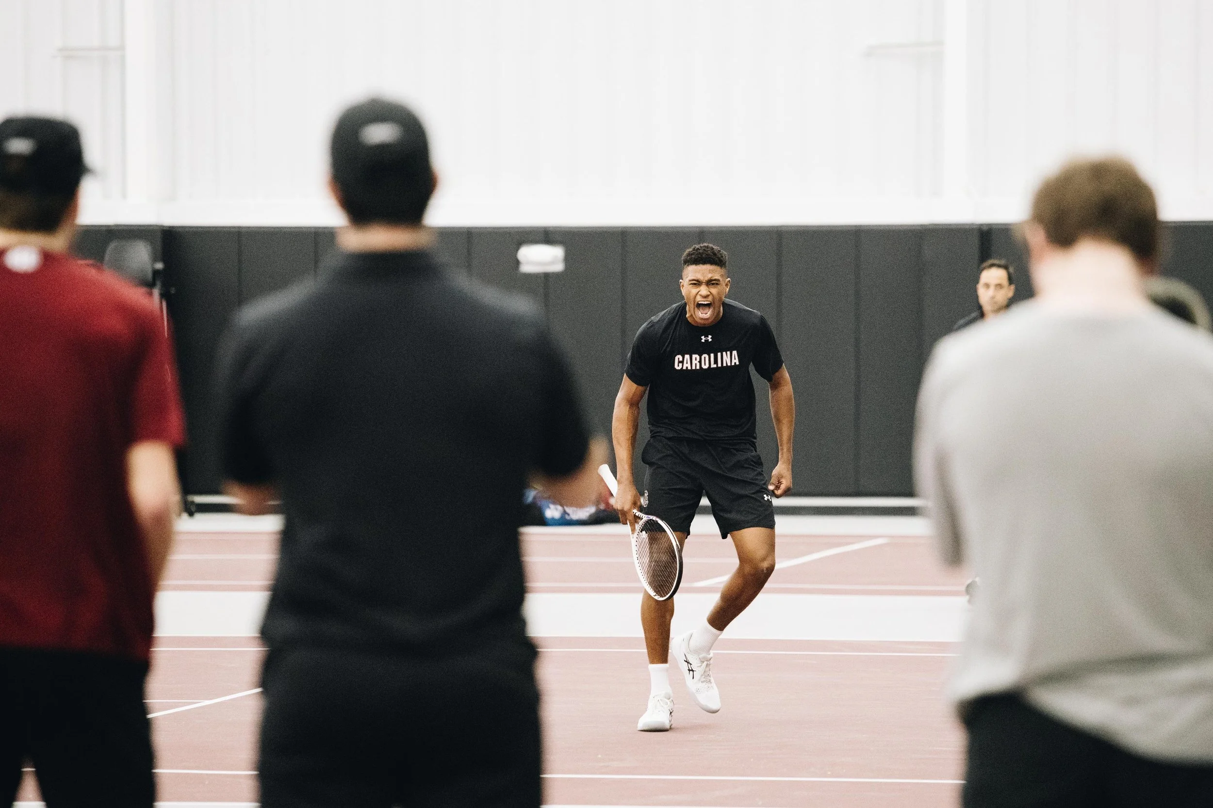 Freshman Jelani Sarr celebrates getting a point during South Carolina’s match against North Carolina State at the Carolina Indoor Tennis Center on Feb. 2, 2024. The Gamecocks lost the match 4-3. 