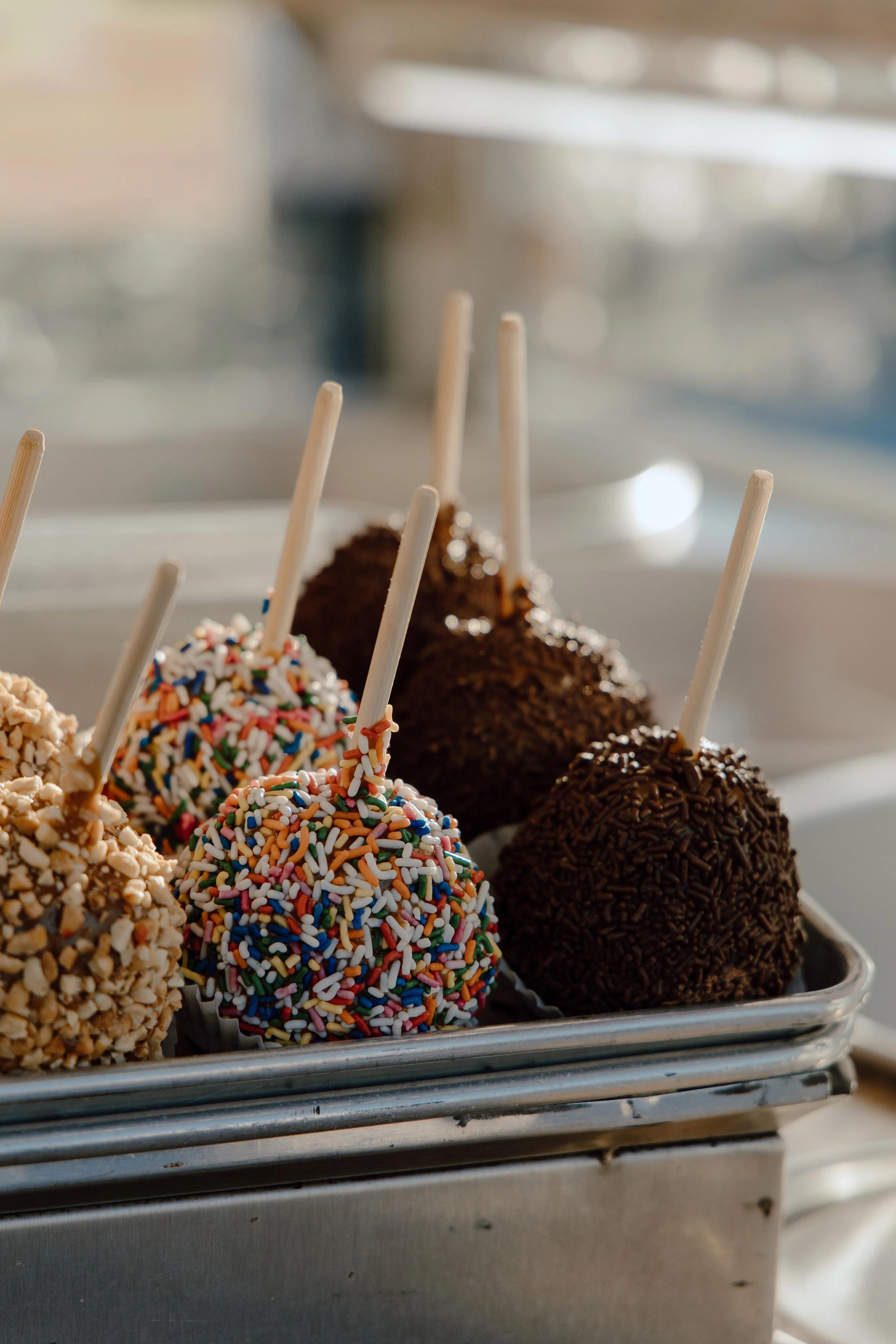 An assortment of candy apples on display for sale at the South Carolina State Fair on Oct. 12, 2024. The state fair this year has more than 90 food stands and around 13 new food stands. 