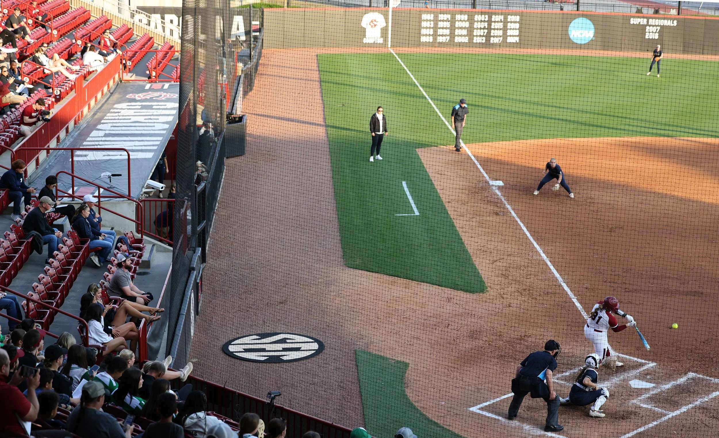 Freshman catcher Maya Flindt prepares to swing as fans watch during the softball game.

The University of South Carolina softball team dominated Charleston Southern 12-0 at the Carolina Softball Stadium on April 9, 2025. The Gamecocks are ranked No. 