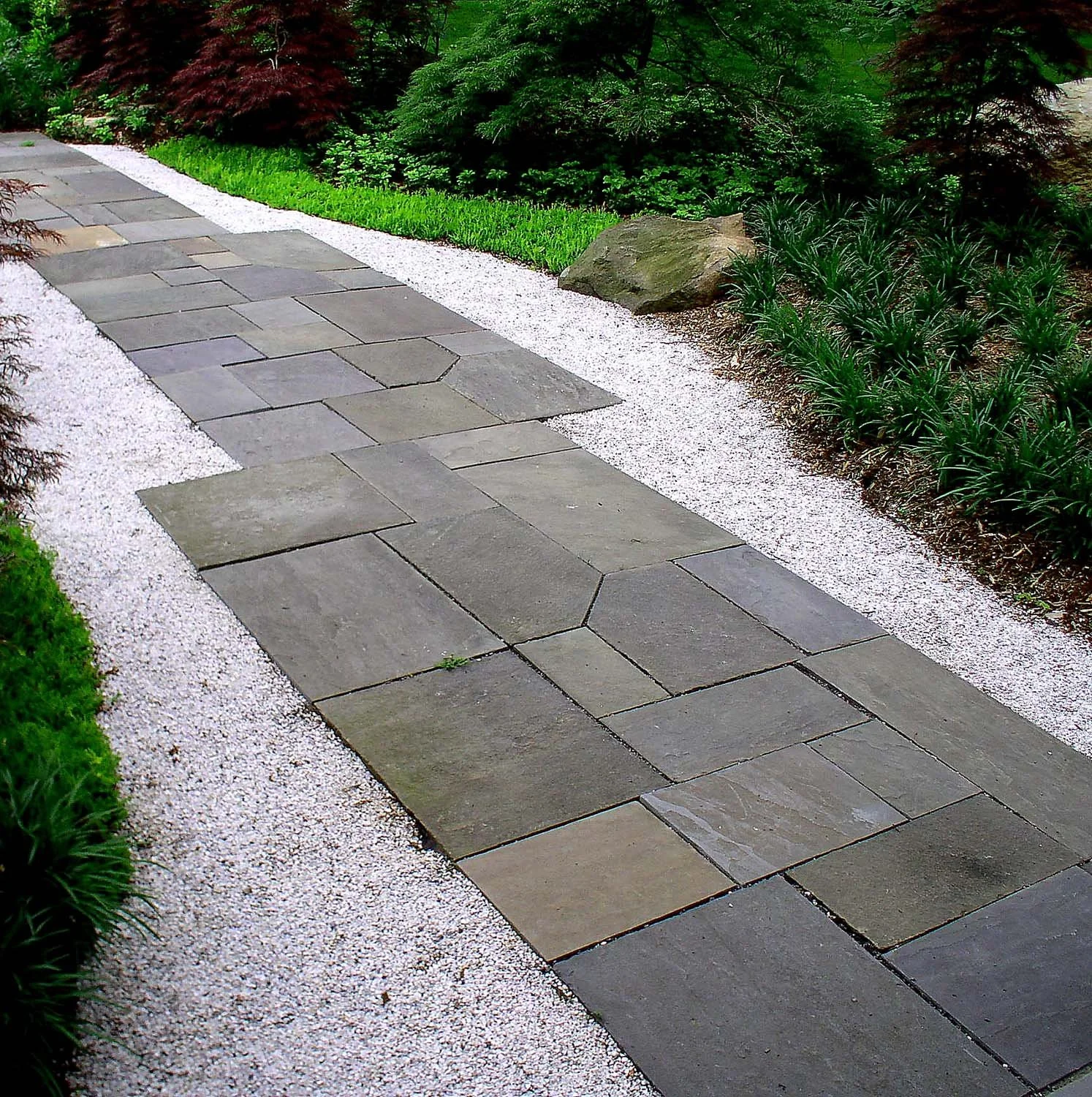 Staggered Bluestone Path in Japanese Entrance Garden