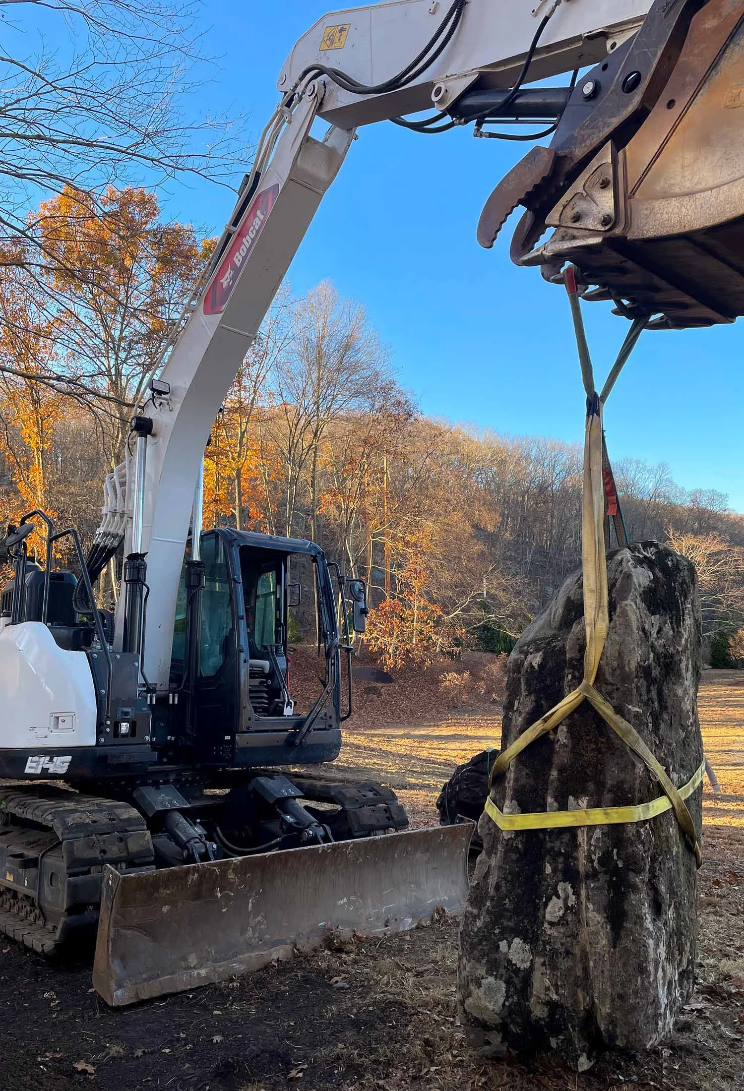 Large Japanese Garden Stone lifted by excavator