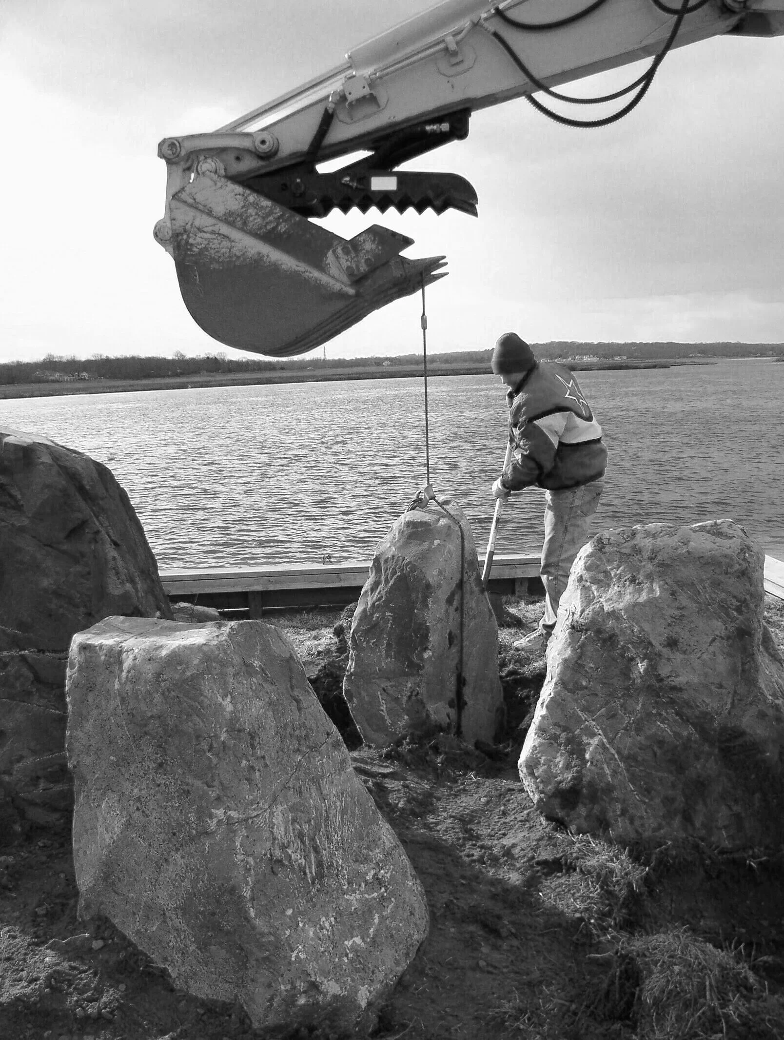 Setting rocks in a Japanese Zen garden on the river at the Jersey Shore