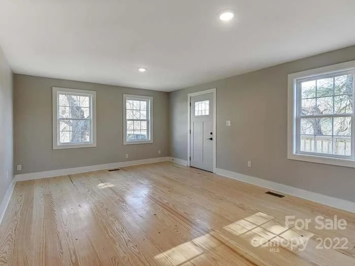Living room front door-from the view of  the hallway near bedroom #1 Master