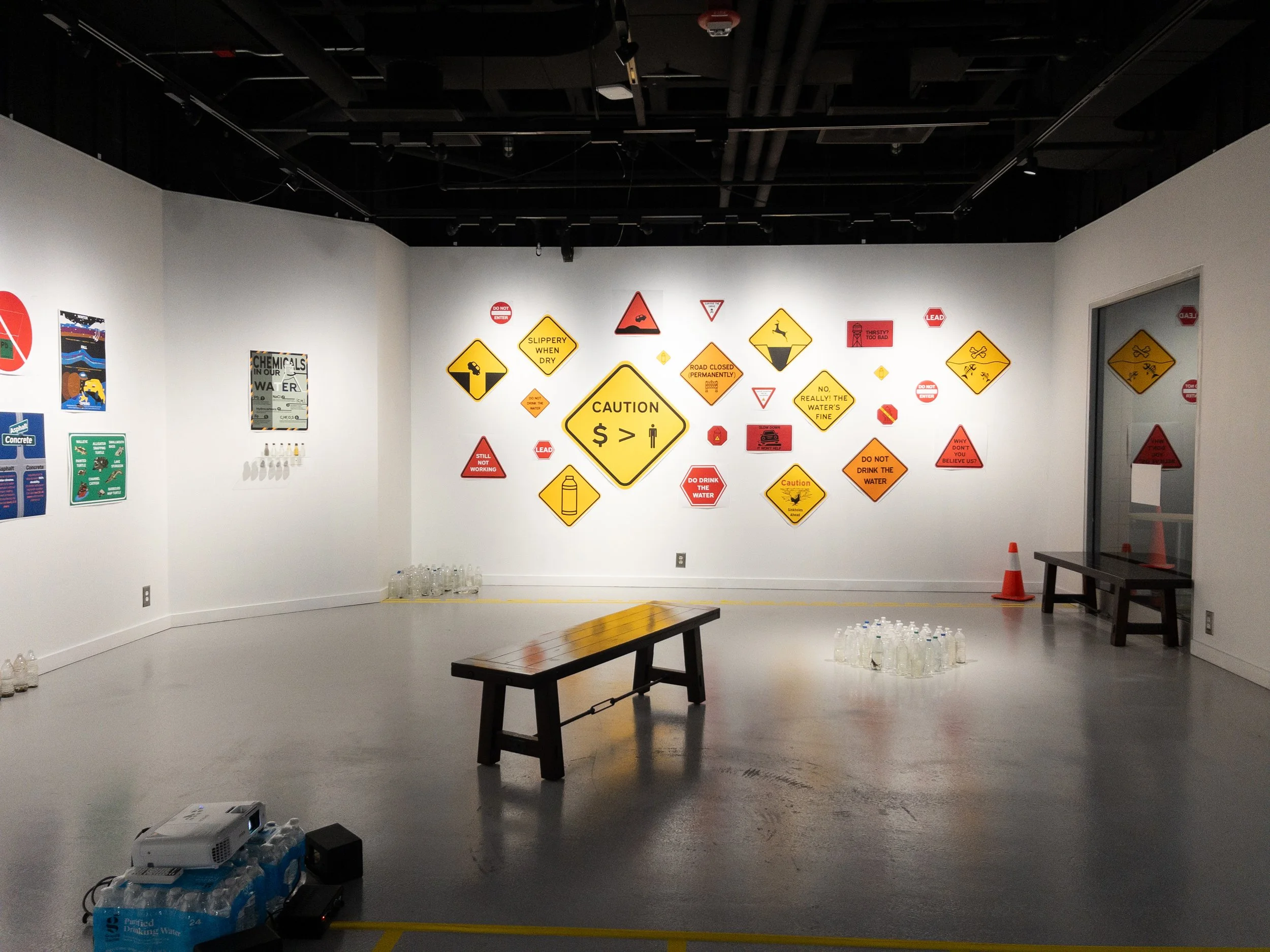 Another section of the exhibition showing road signs and traffic cones.