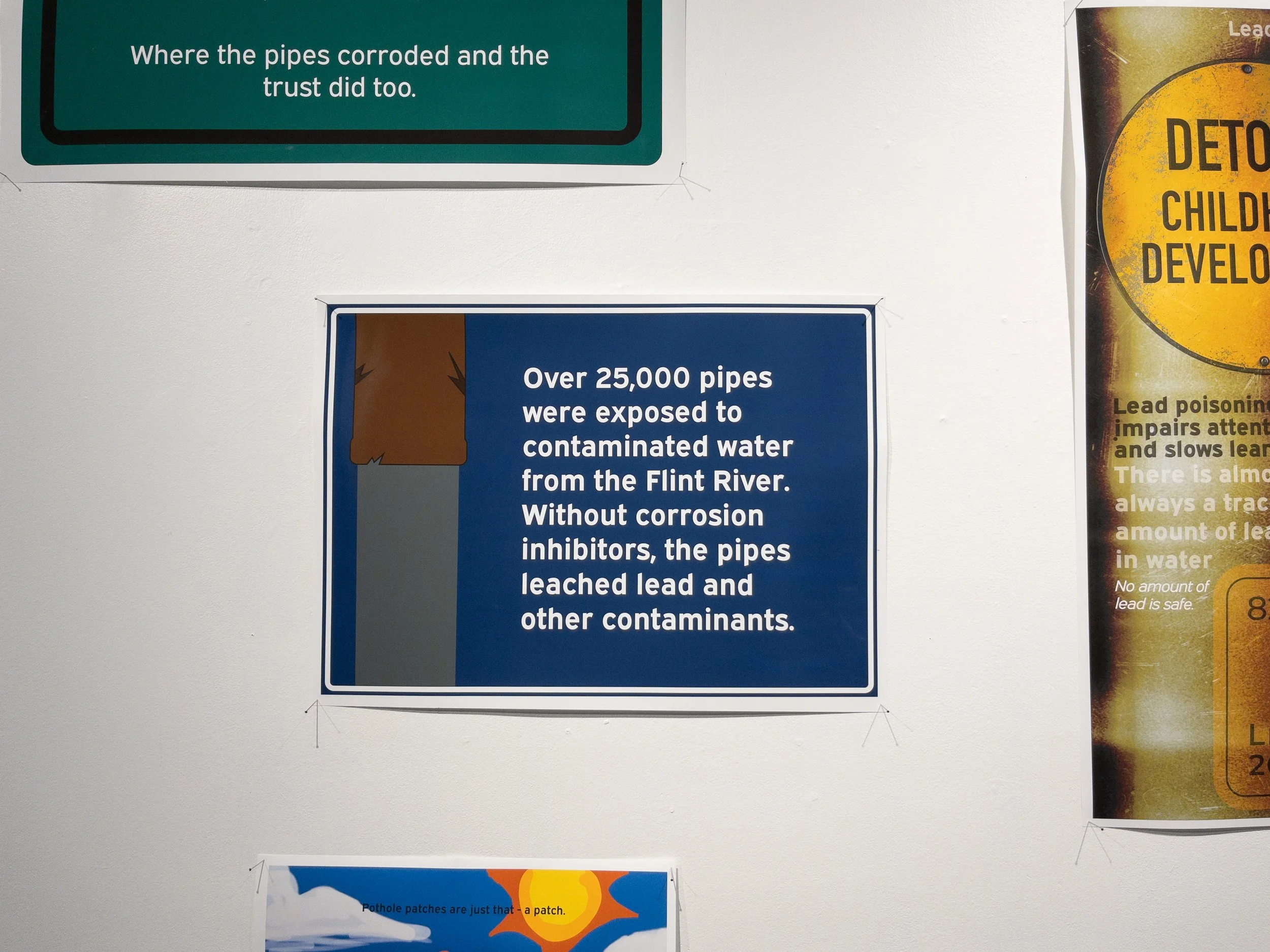 Picture of the pipe corrosion poster in the exhibition.