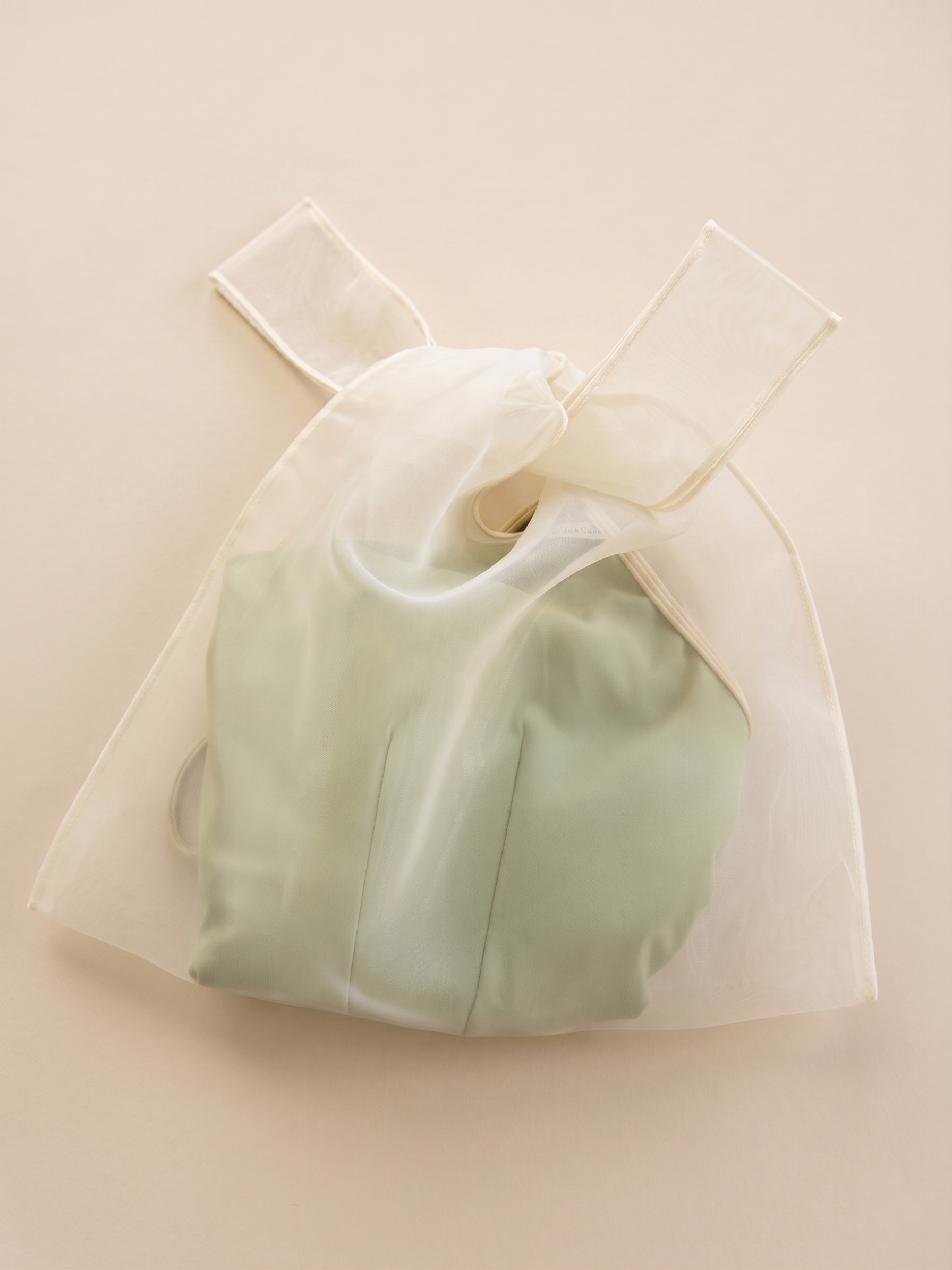A beautiful ballet leotard stylishly packaged in organza bag, fitting the signature style of Eaan Dancewear. Bags only available for orders 4+.
