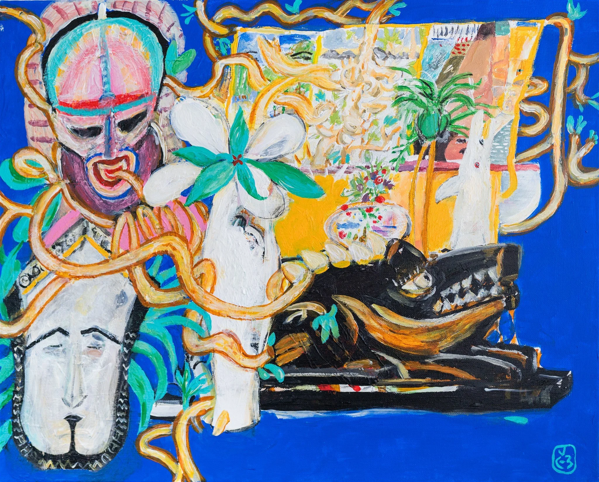 Colorful abstract painting featuring a dragon head, a large flower with white petals and green leaves, a partially visible portrait mask, a black carved wooden surface with gold accents, and various decorative objects including a potted plant, a vase