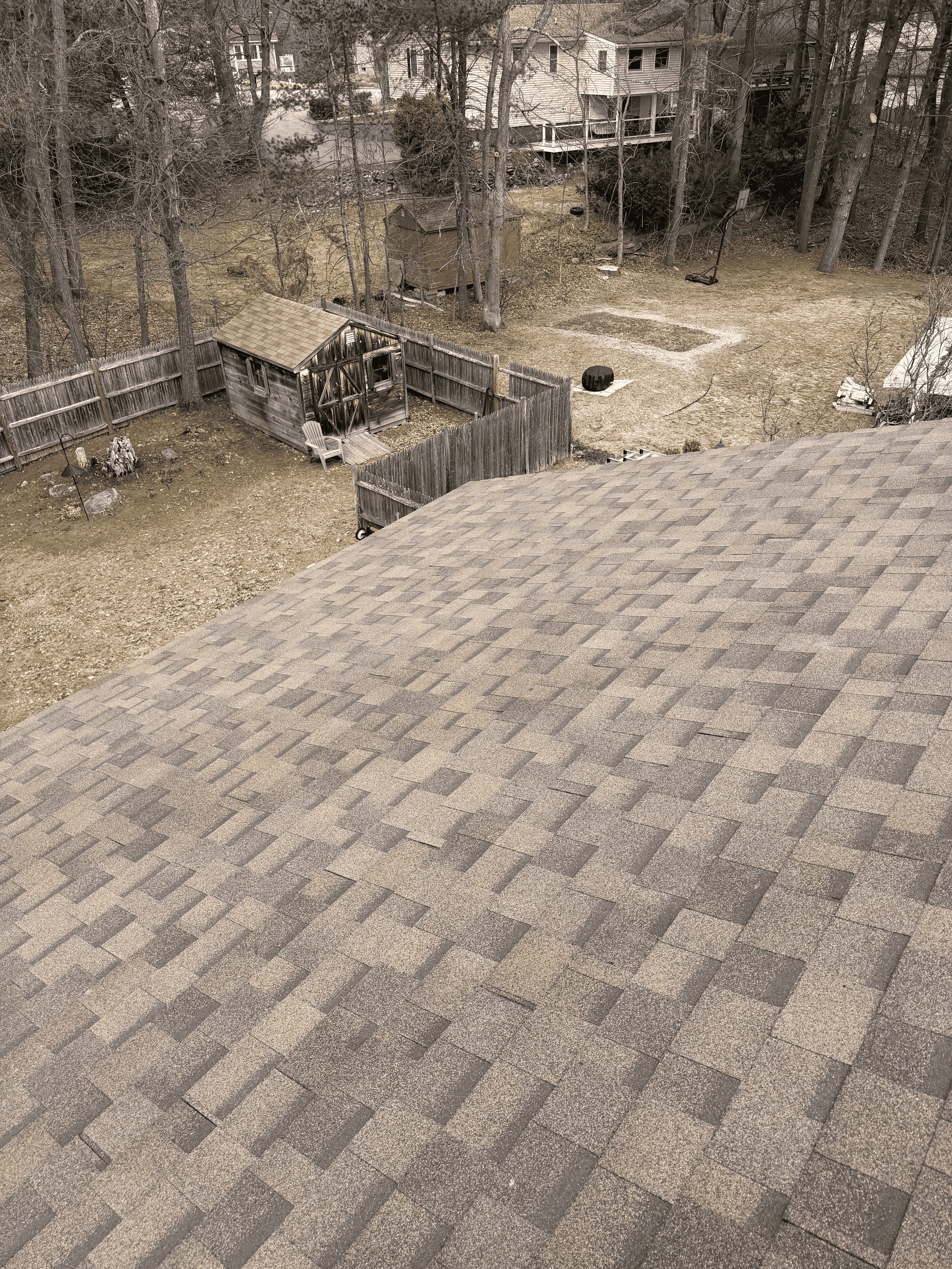 House roof with asphalt shingles, roof replacement complete