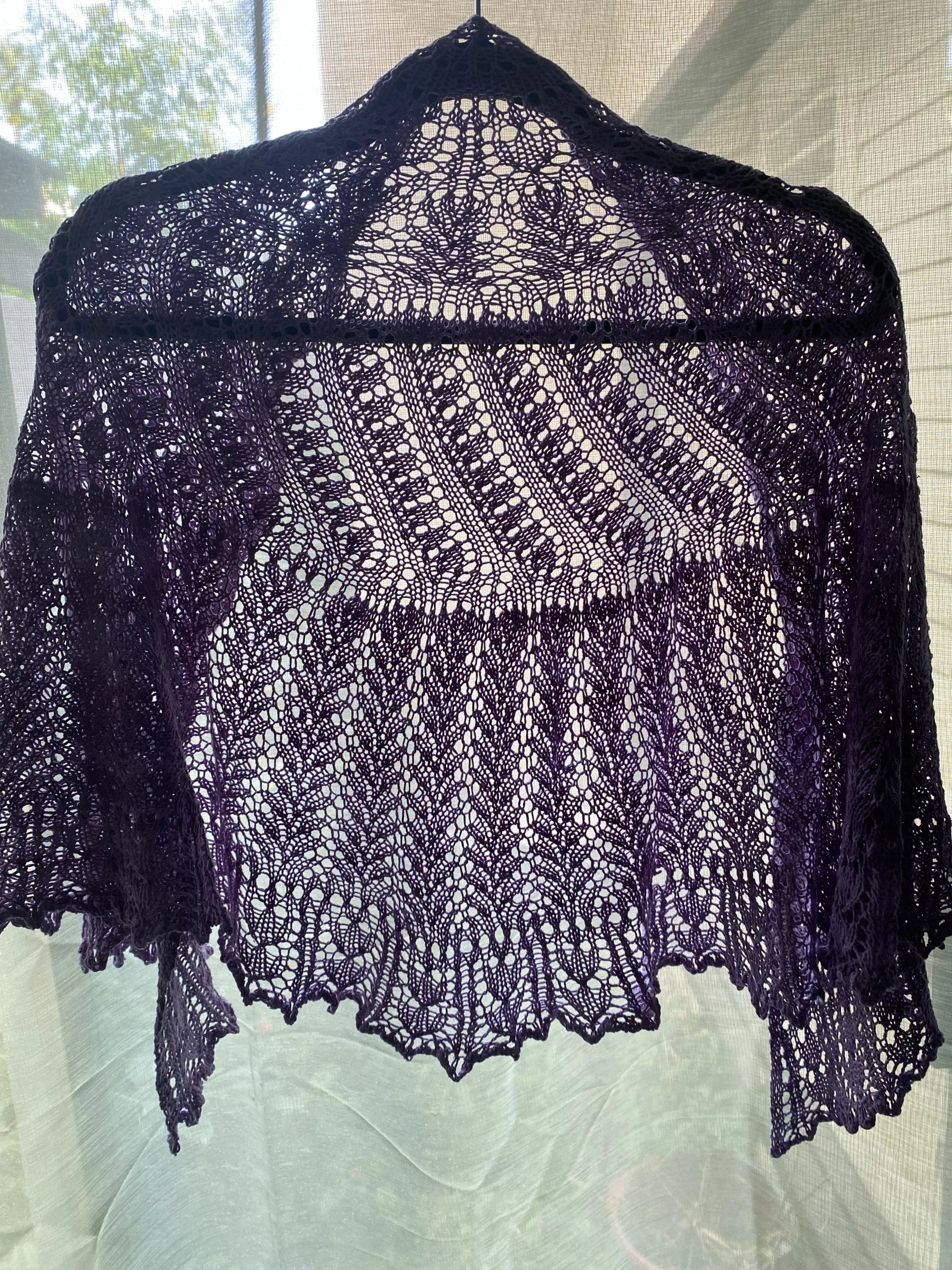 Hand-knitted silk lace shawl.