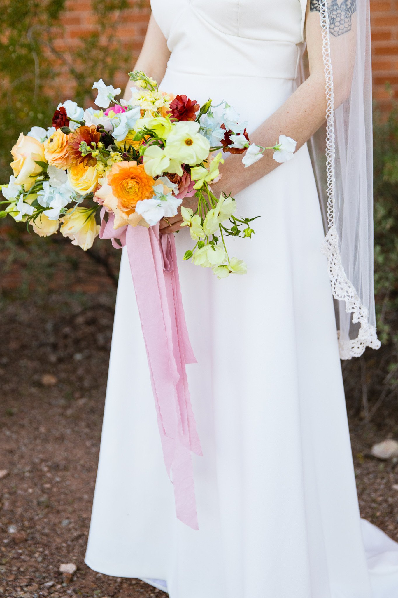 Handmade lace and hand beading on a custom wedding veil.